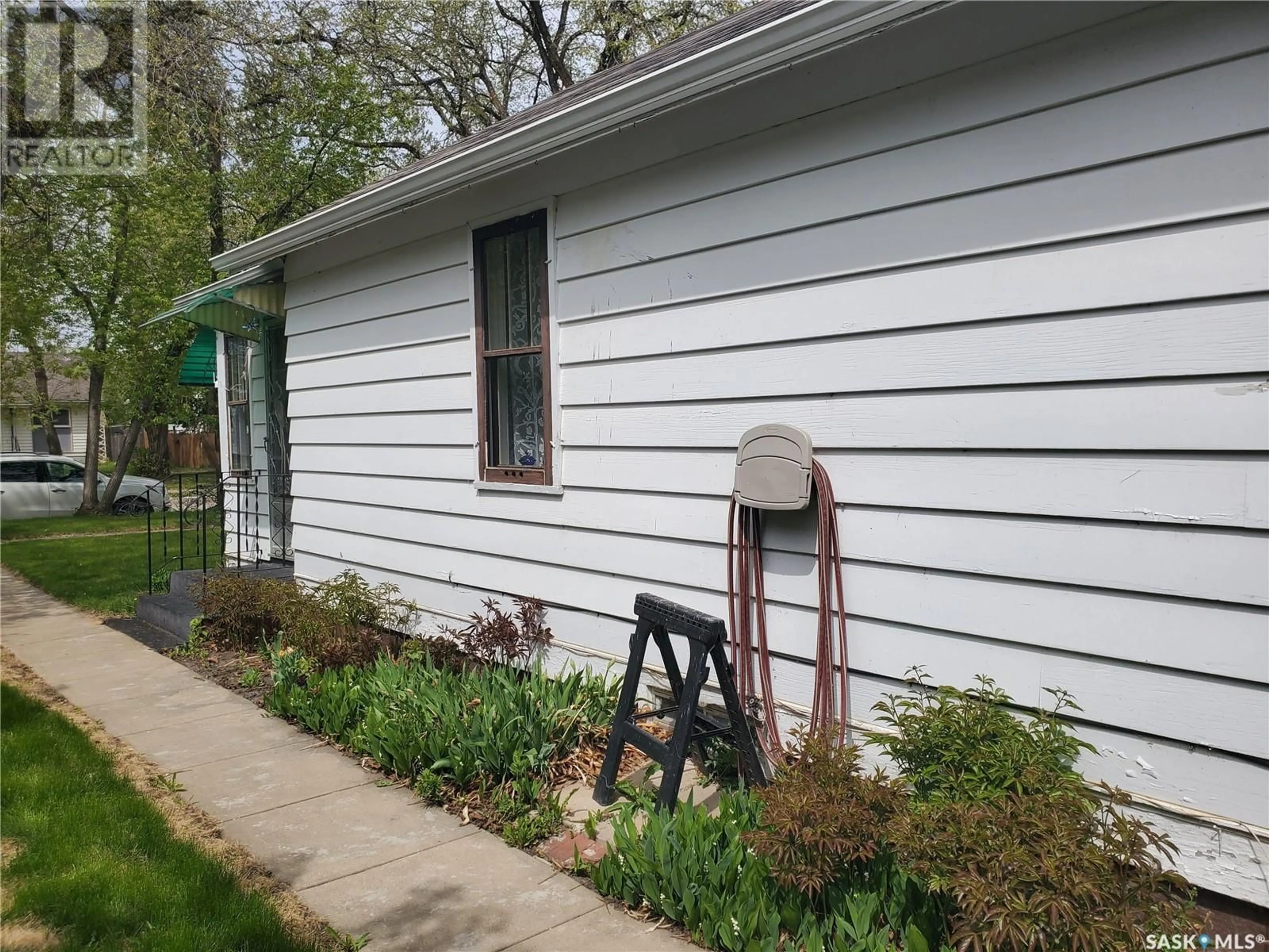 Home with vinyl exterior material, street for 236 THIRD AVENUE, Kamsack Saskatchewan S0A1S0