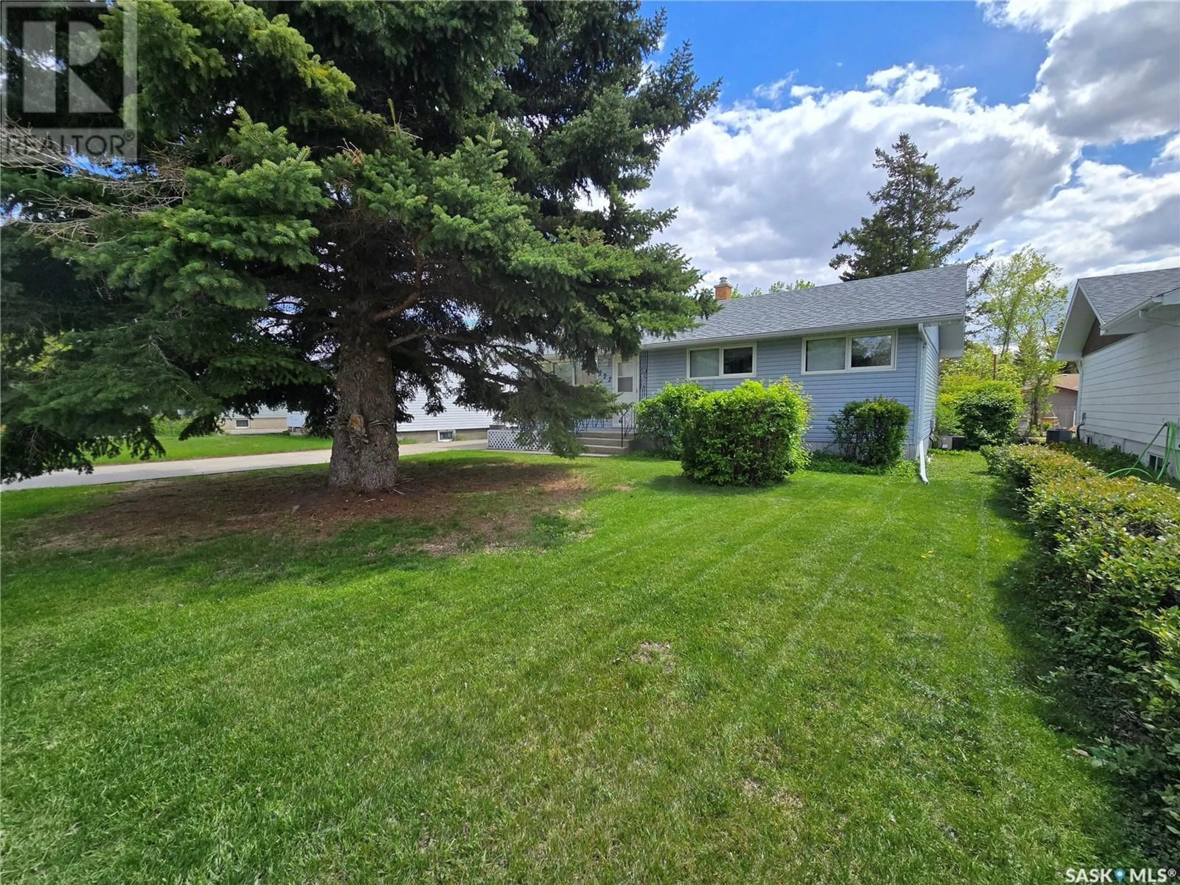 A pic from outside/outdoor area/front of a property/back of a property/a pic from drone, street for 222 DOUGLAS ROAD, Weyburn Saskatchewan S4H0N4