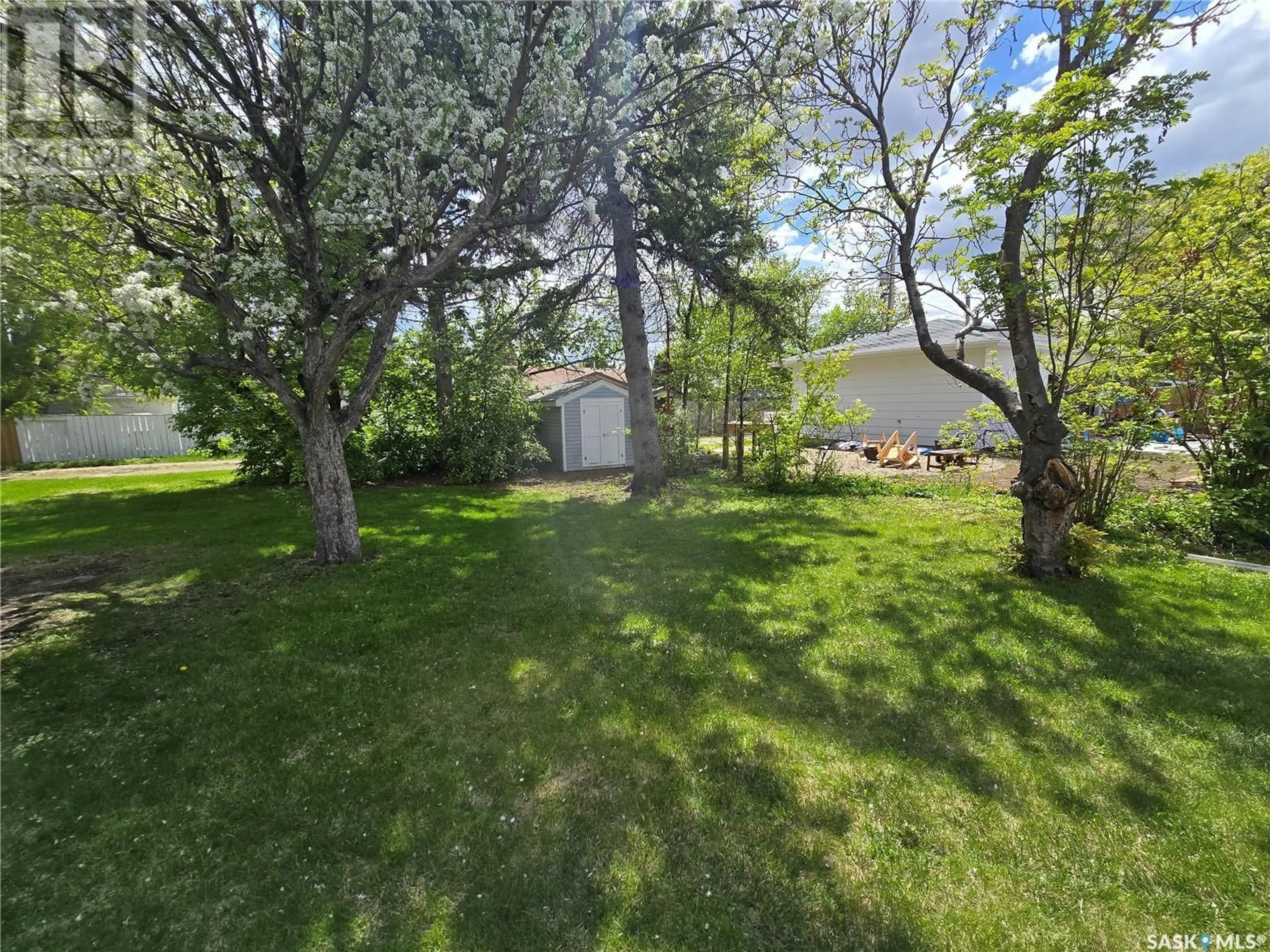 A pic from outside/outdoor area/front of a property/back of a property/a pic from drone, unknown for 222 DOUGLAS ROAD, Weyburn Saskatchewan S4H0N4