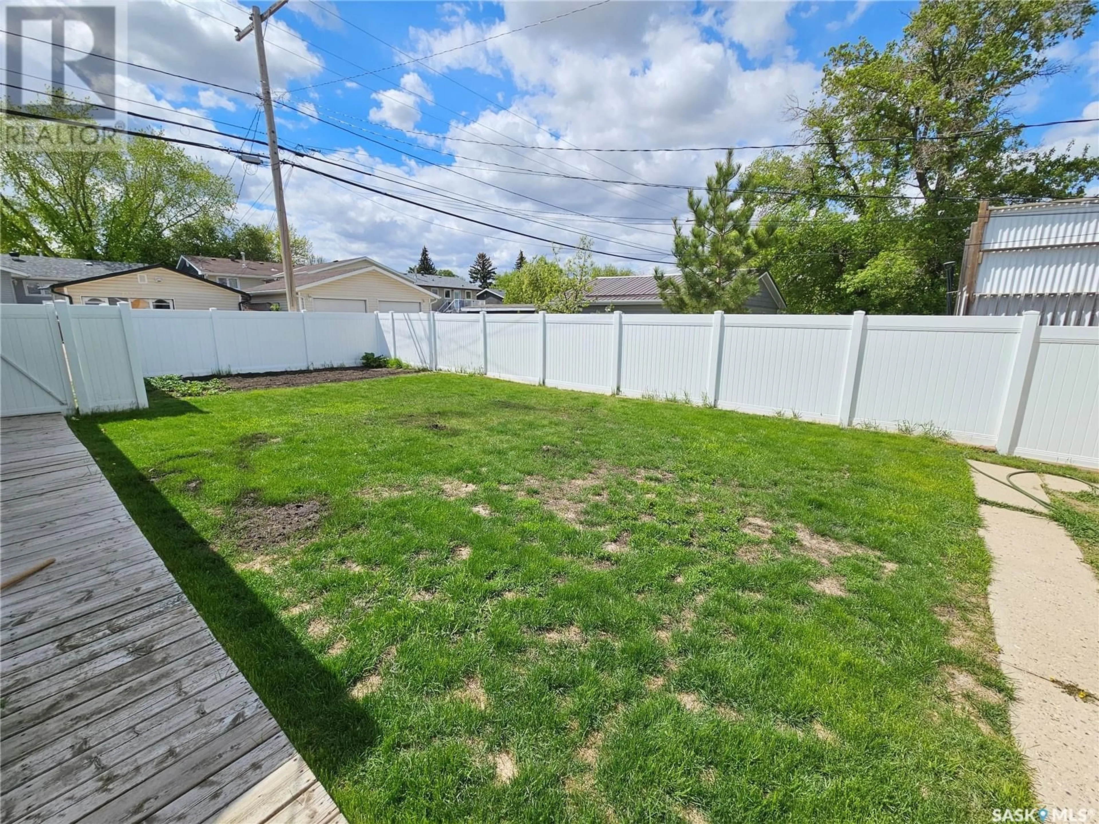A pic from outside/outdoor area/front of a property/back of a property/a pic from drone, street for 1331 COTEAU STREET, Moose Jaw Saskatchewan S6H5G9