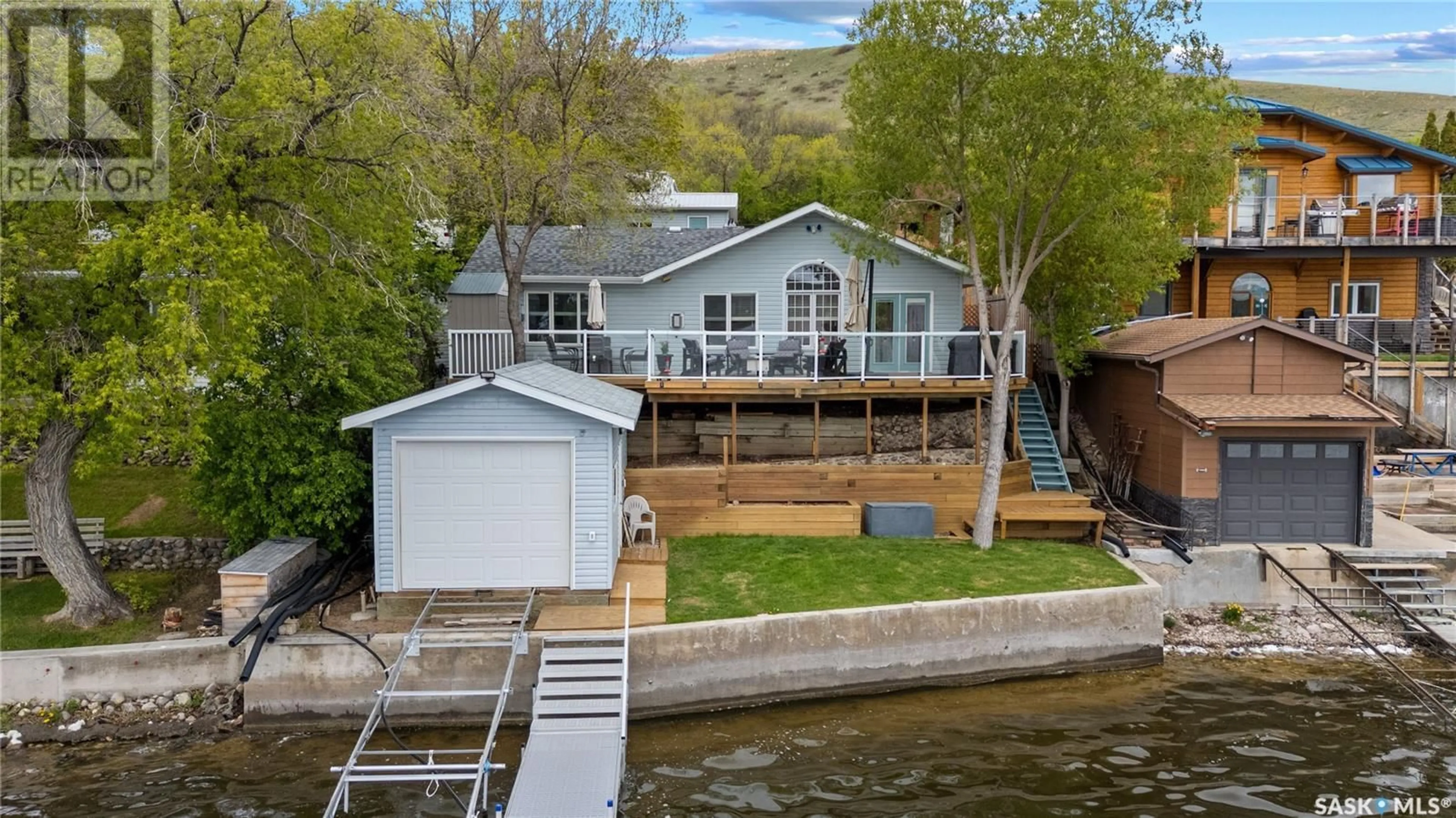 A pic from outside/outdoor area/front of a property/back of a property/a pic from drone, water/lake/river/ocean view for 268 PASQUA LAKE ROAD, North Qu'Appelle Rm No. 187 Saskatchewan S0G1S0