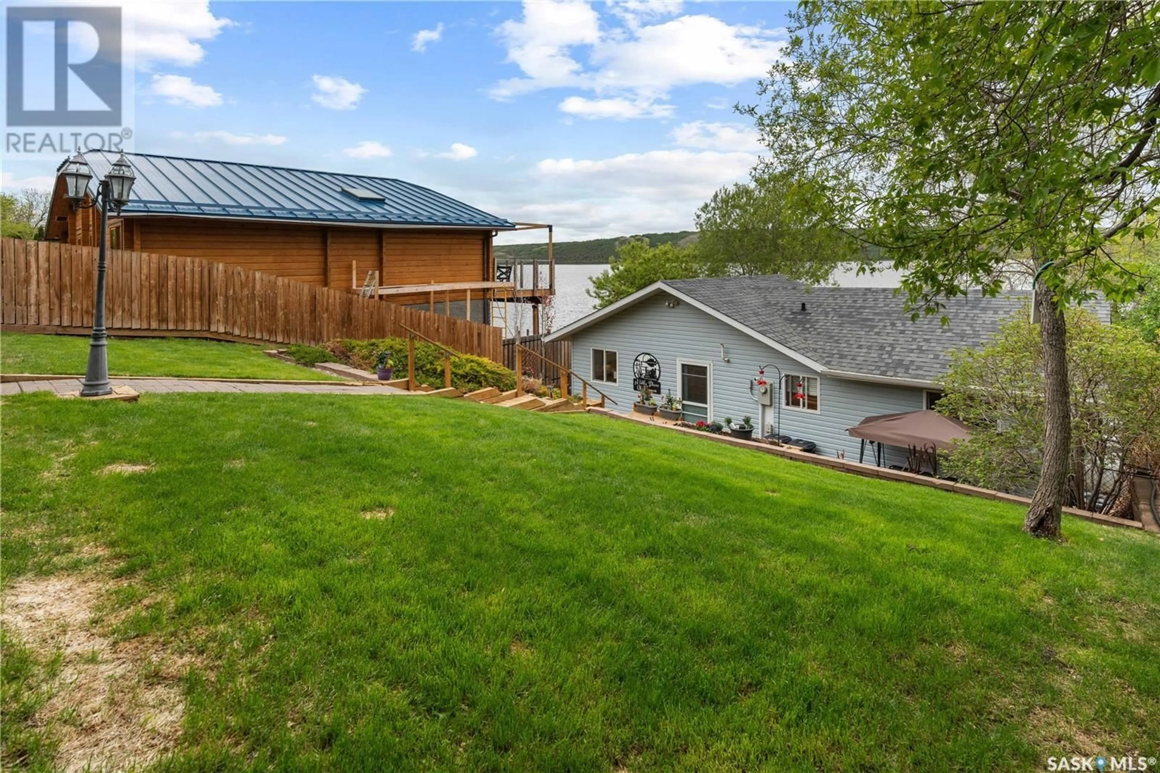 A pic from outside/outdoor area/front of a property/back of a property/a pic from drone, water/lake/river/ocean view for 268 PASQUA LAKE ROAD, North Qu'Appelle Rm No. 187 Saskatchewan S0G1S0
