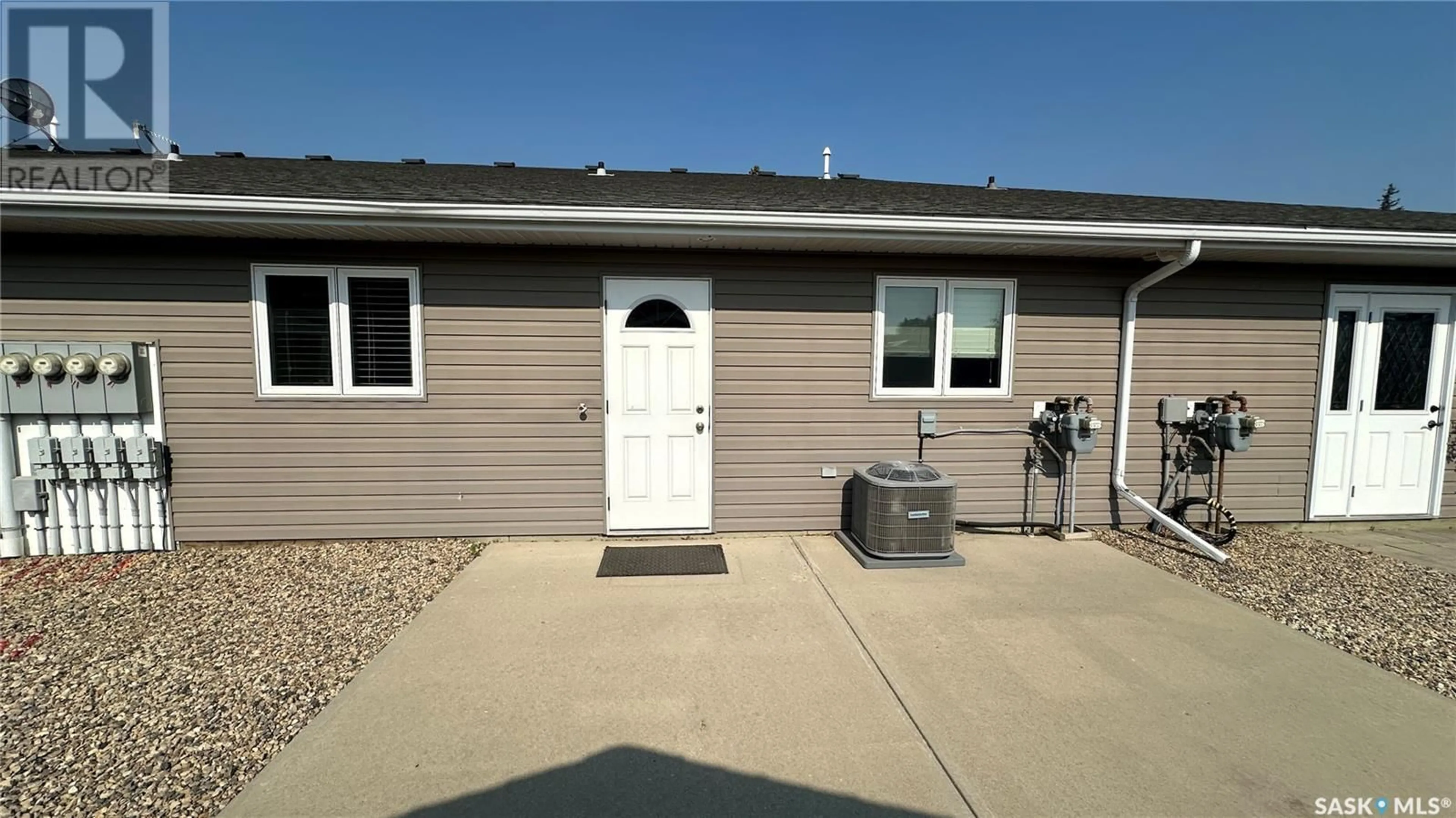 Home with vinyl exterior material, street for C - 1100 95TH AVENUE, Tisdale Saskatchewan S0E1T0