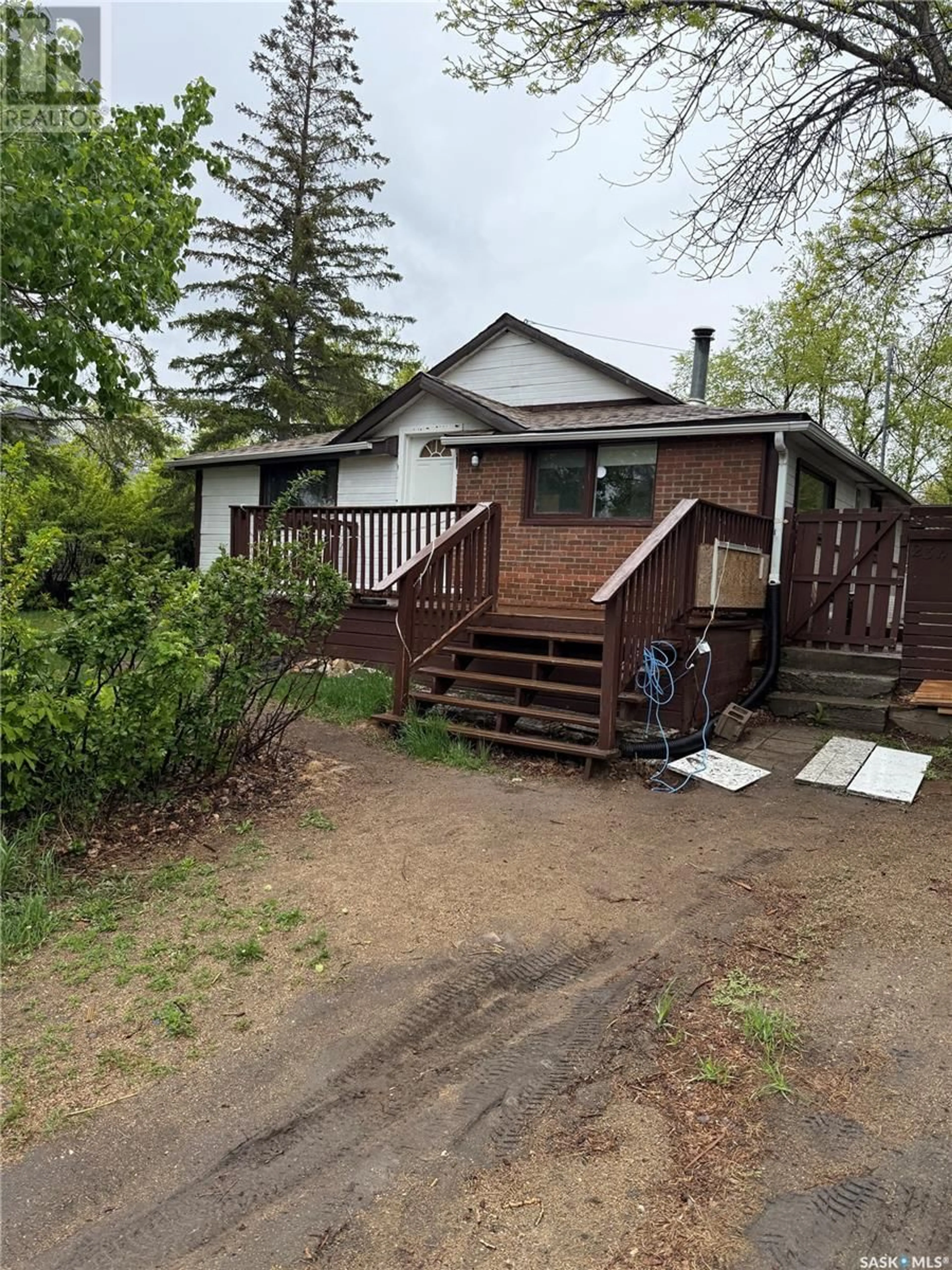 A pic from outside/outdoor area/front of a property/back of a property/a pic from drone, street for 234 MACMURCHY AVENUE, Regina Beach Saskatchewan S0G4C0