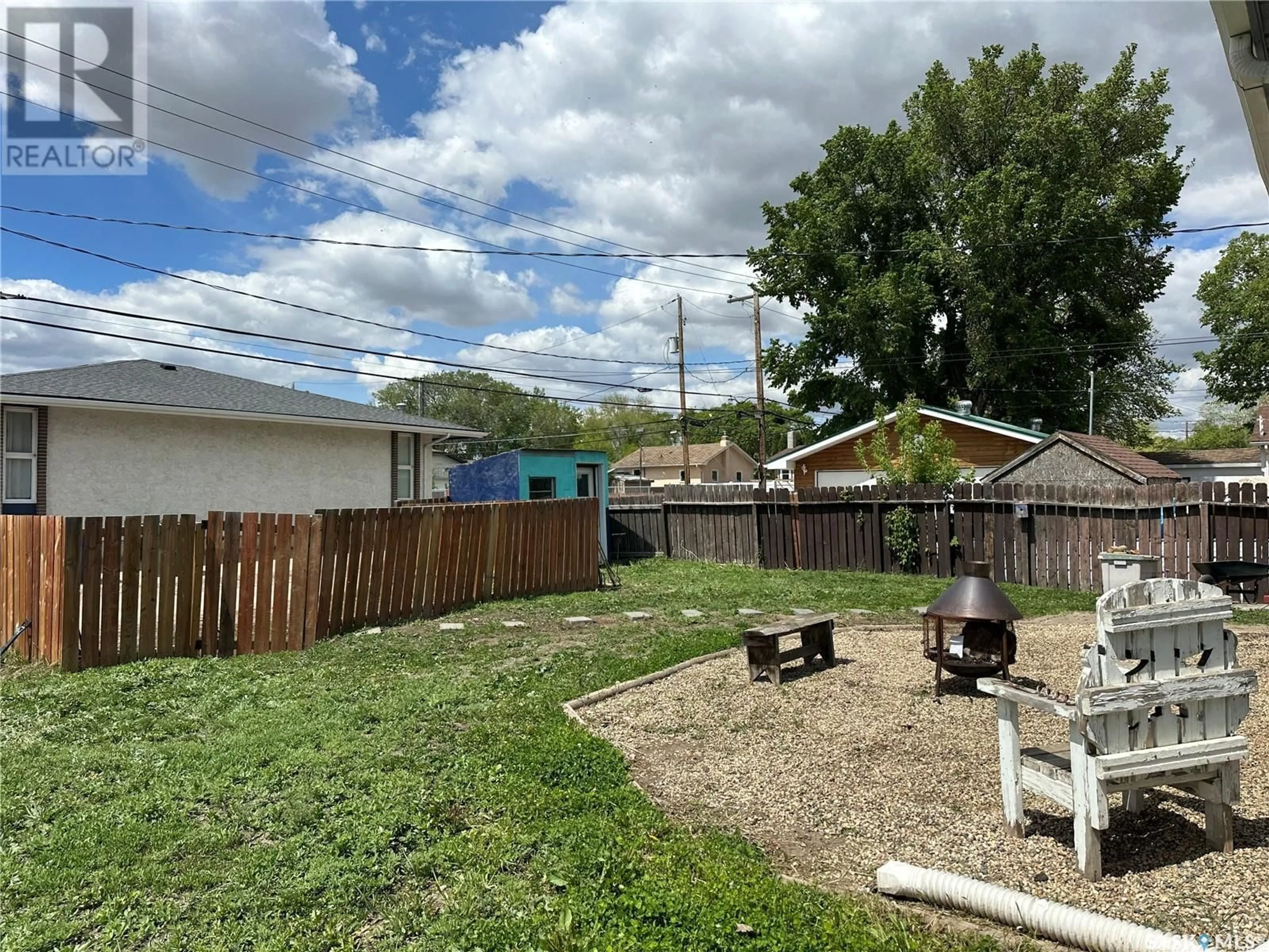 A pic from outside/outdoor area/front of a property/back of a property/a pic from drone, street for 1008 9TH AVENUE, Moose Jaw Saskatchewan S6H4J5
