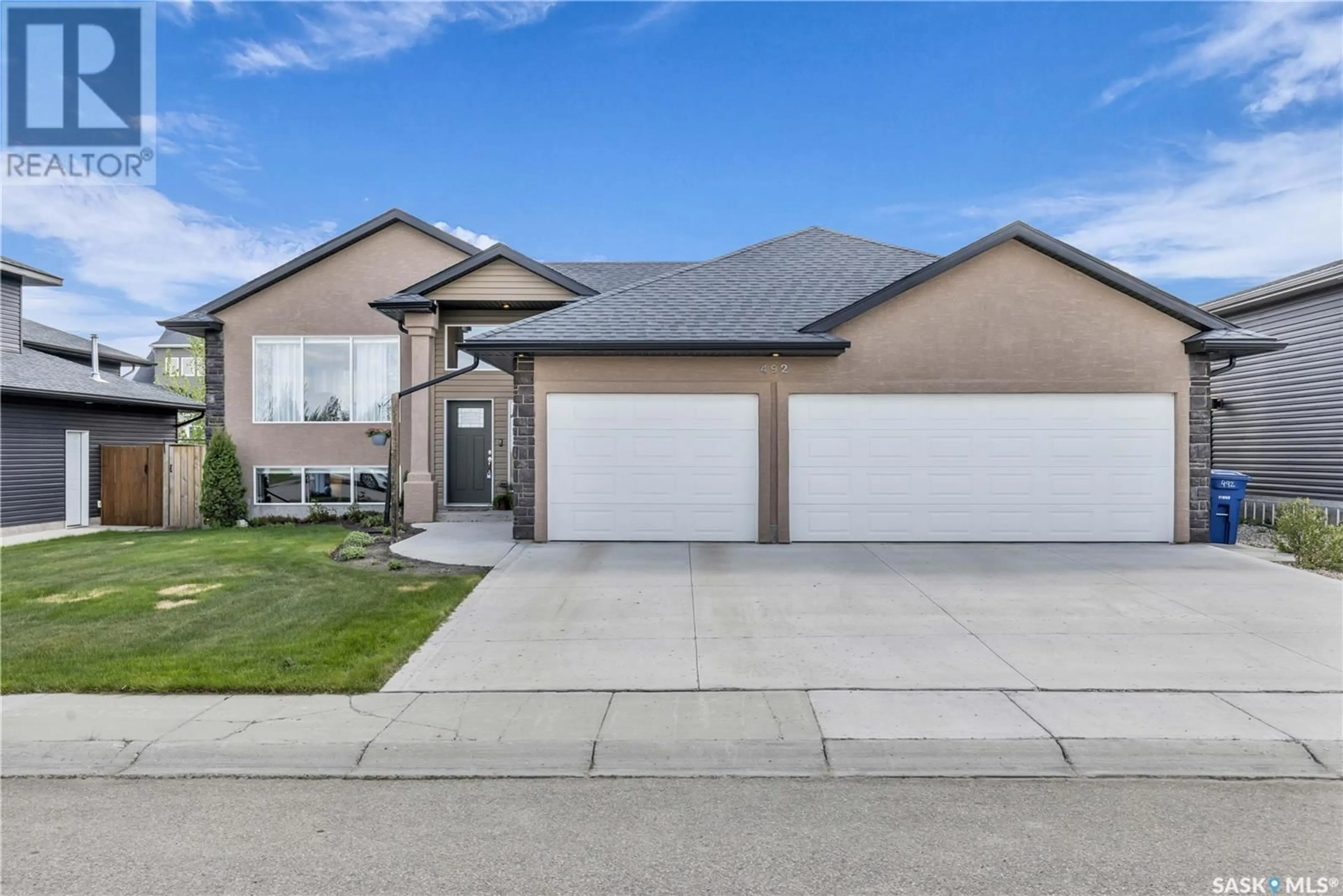Home with vinyl exterior material, street for 492 16TH AVENUE, Humboldt Saskatchewan S0K2A0