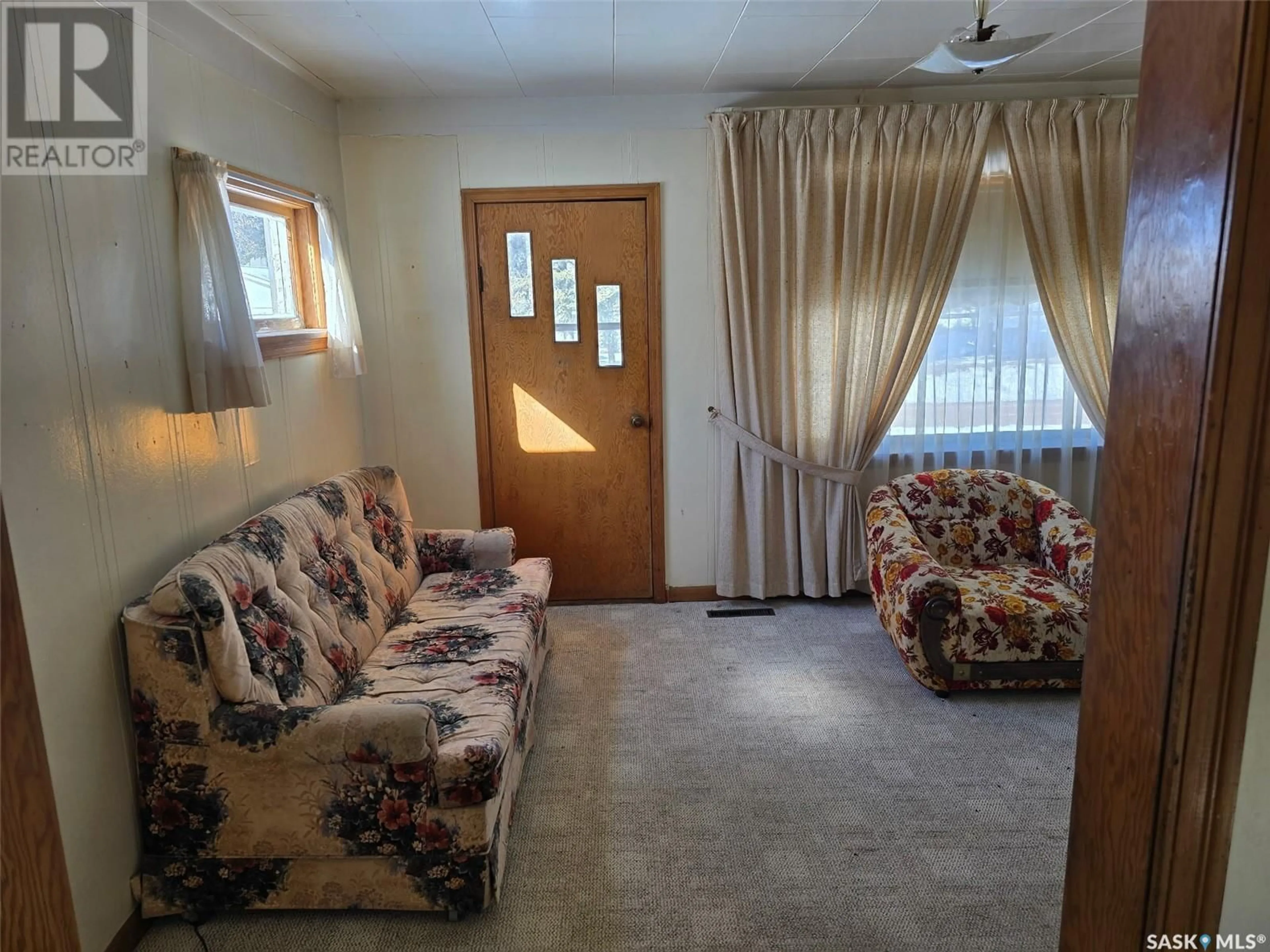 Living room with furniture, unknown for 200 RAILWAY AVENUE, Norquay Saskatchewan S0A2V0