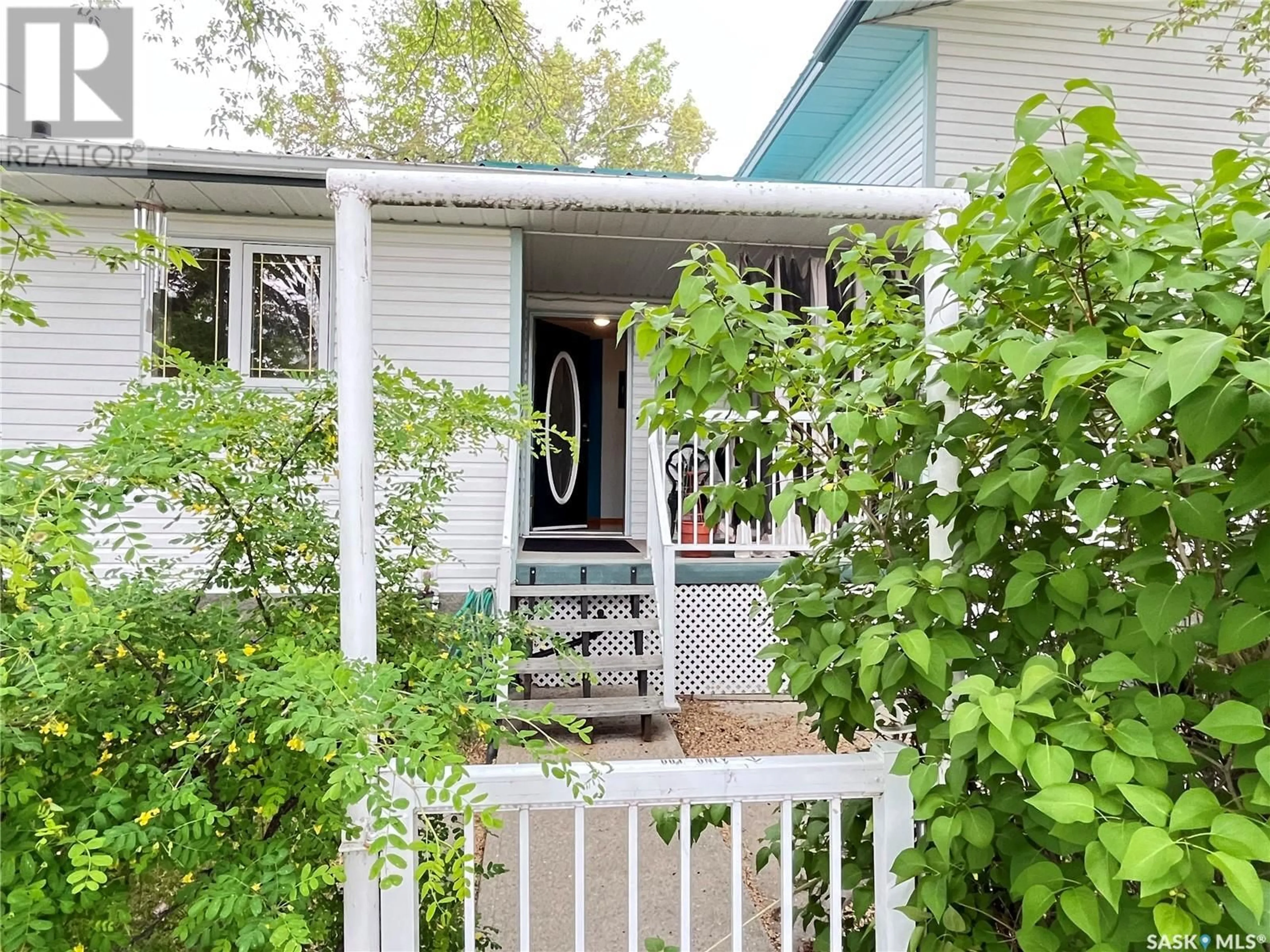 Home with vinyl exterior material, street for 201 ASPEN STREET, Maple Creek Saskatchewan S0N1N0