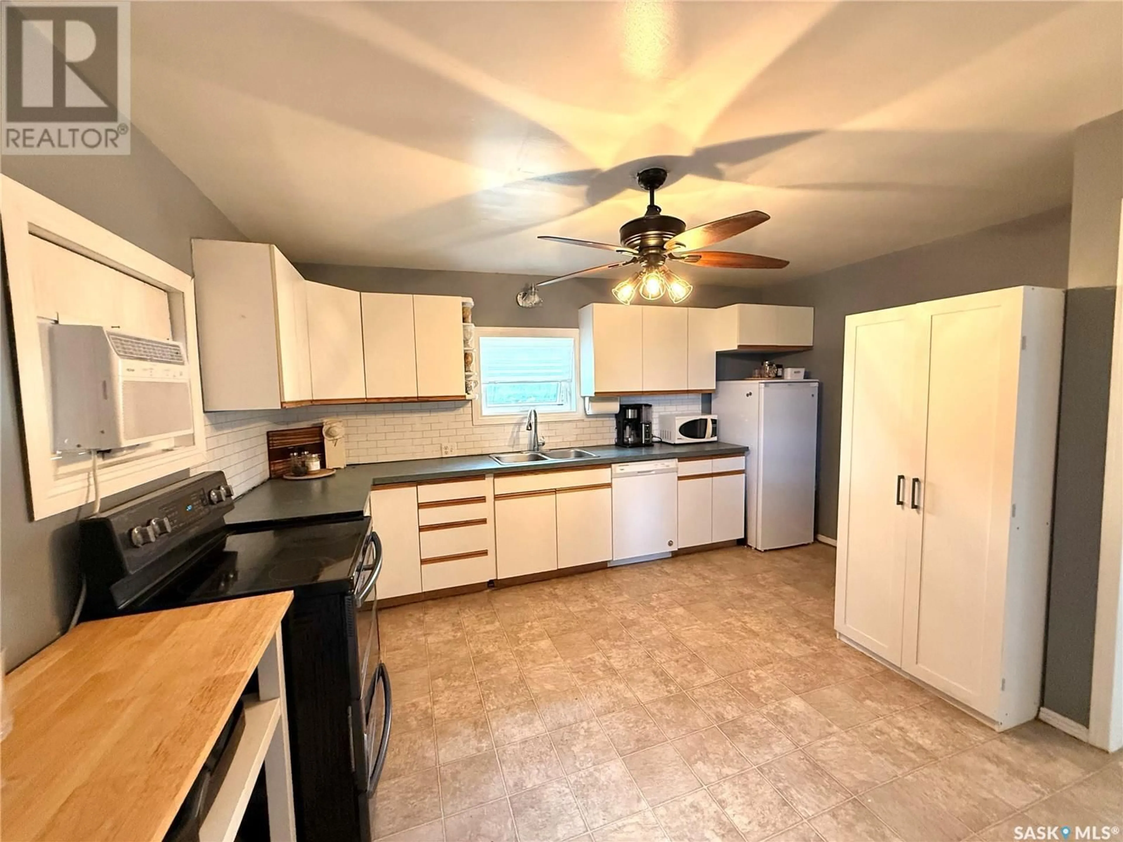Open concept kitchen, ceramic/tile floor for 201 CHARLES STREET, Stewart Valley Saskatchewan S0N2P0