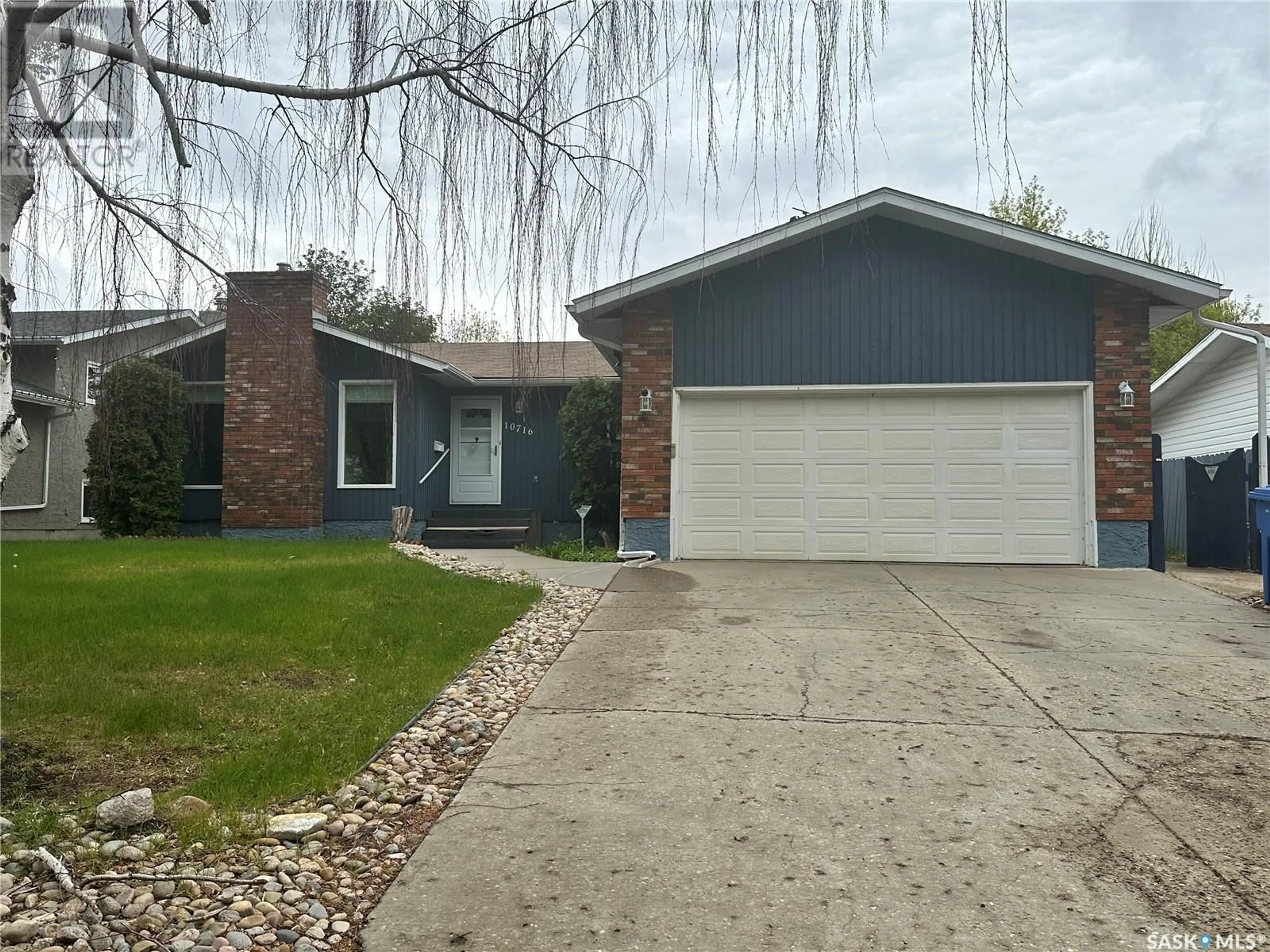 Home with vinyl exterior material, street for 10716 MEIGHEN CRESCENT, North Battleford Saskatchewan S9A3L1