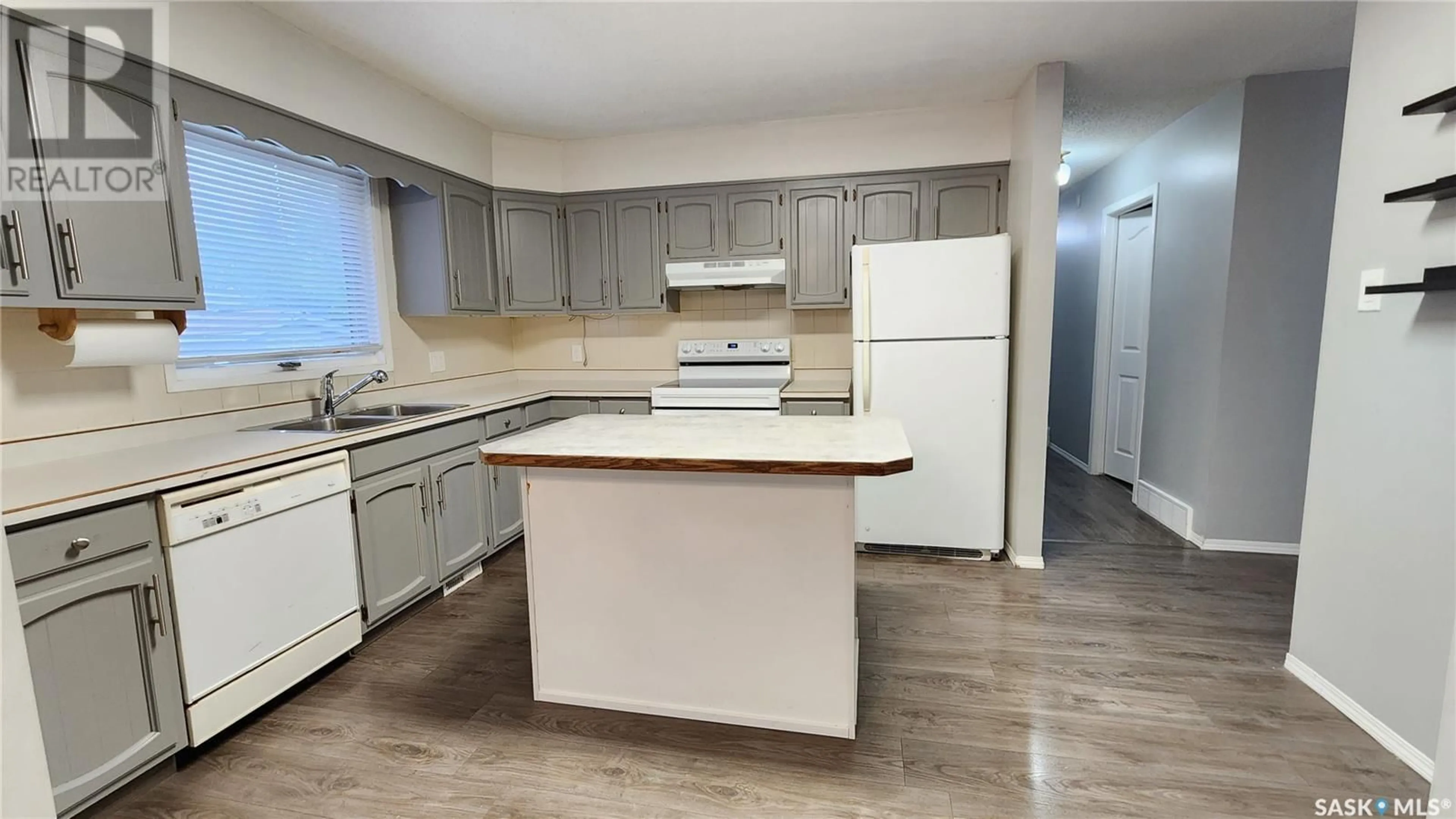 Standard kitchen, wood/laminate floor for 10716 MEIGHEN CRESCENT, North Battleford Saskatchewan S9A3L1