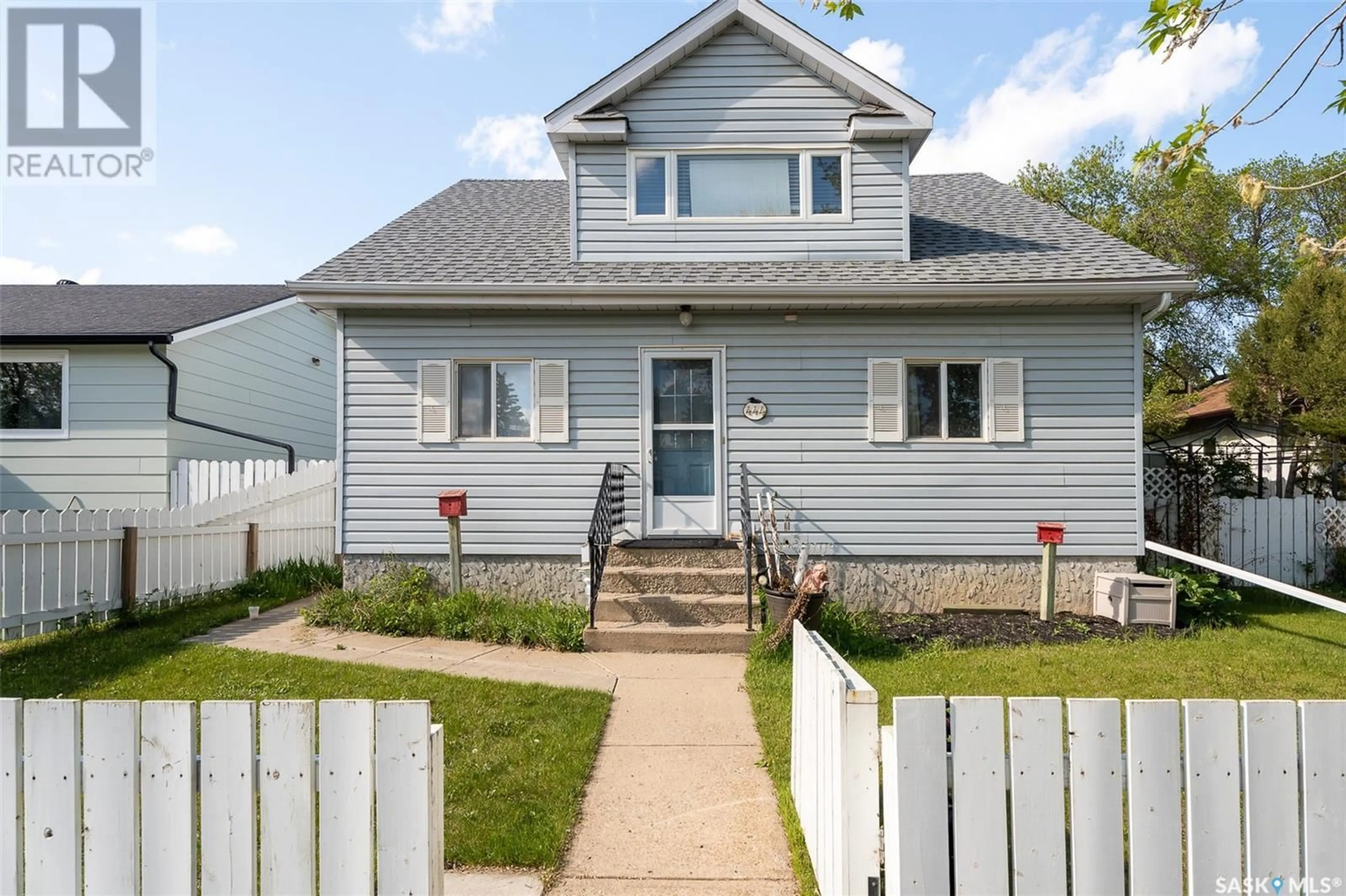 Home with vinyl exterior material, street for 444 OMINICA STREET, Moose Jaw Saskatchewan S6H0G9
