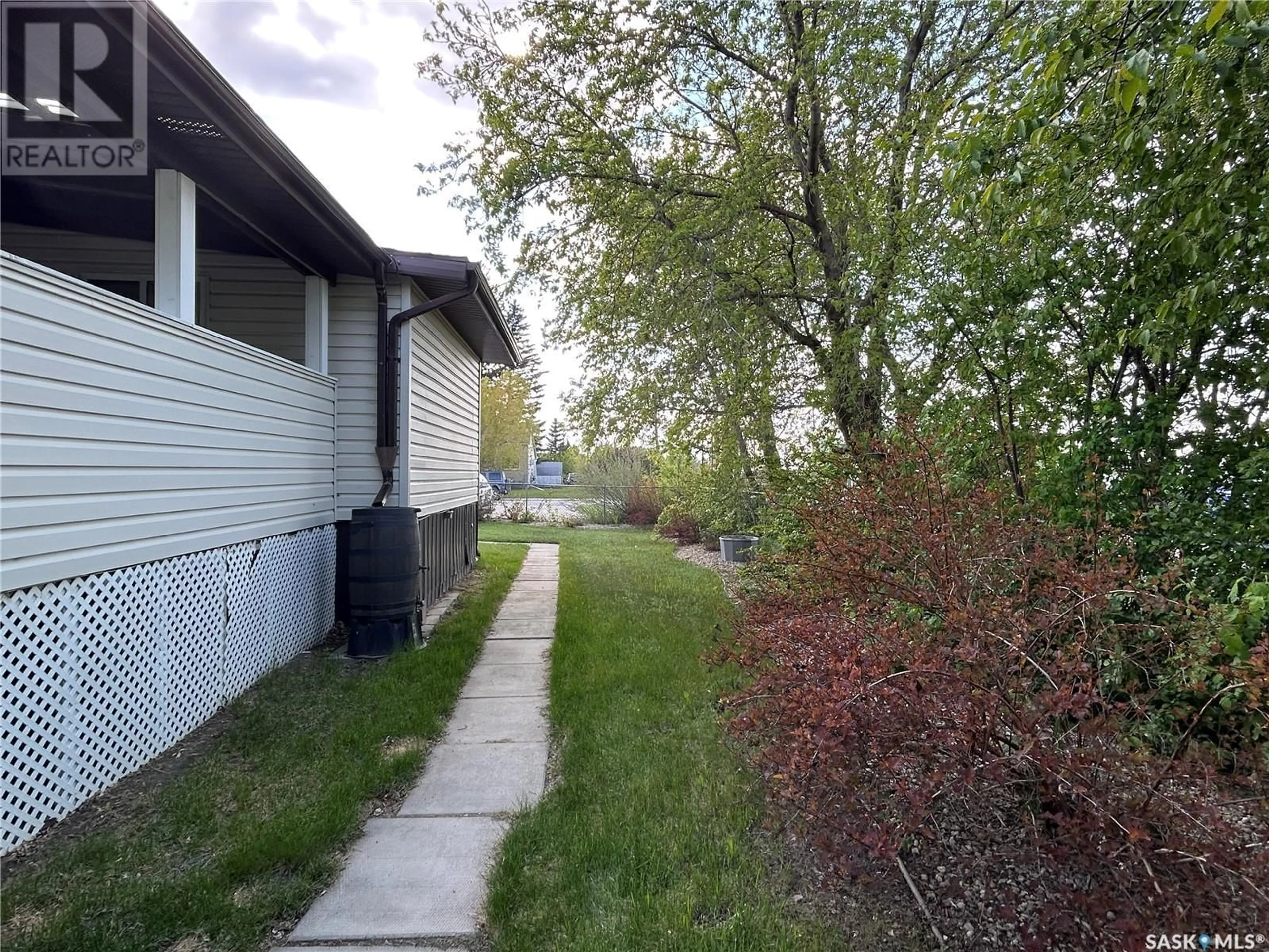 A pic from outside/outdoor area/front of a property/back of a property/a pic from drone, street for 238 13TH STREET, Humboldt Saskatchewan S0K2A0