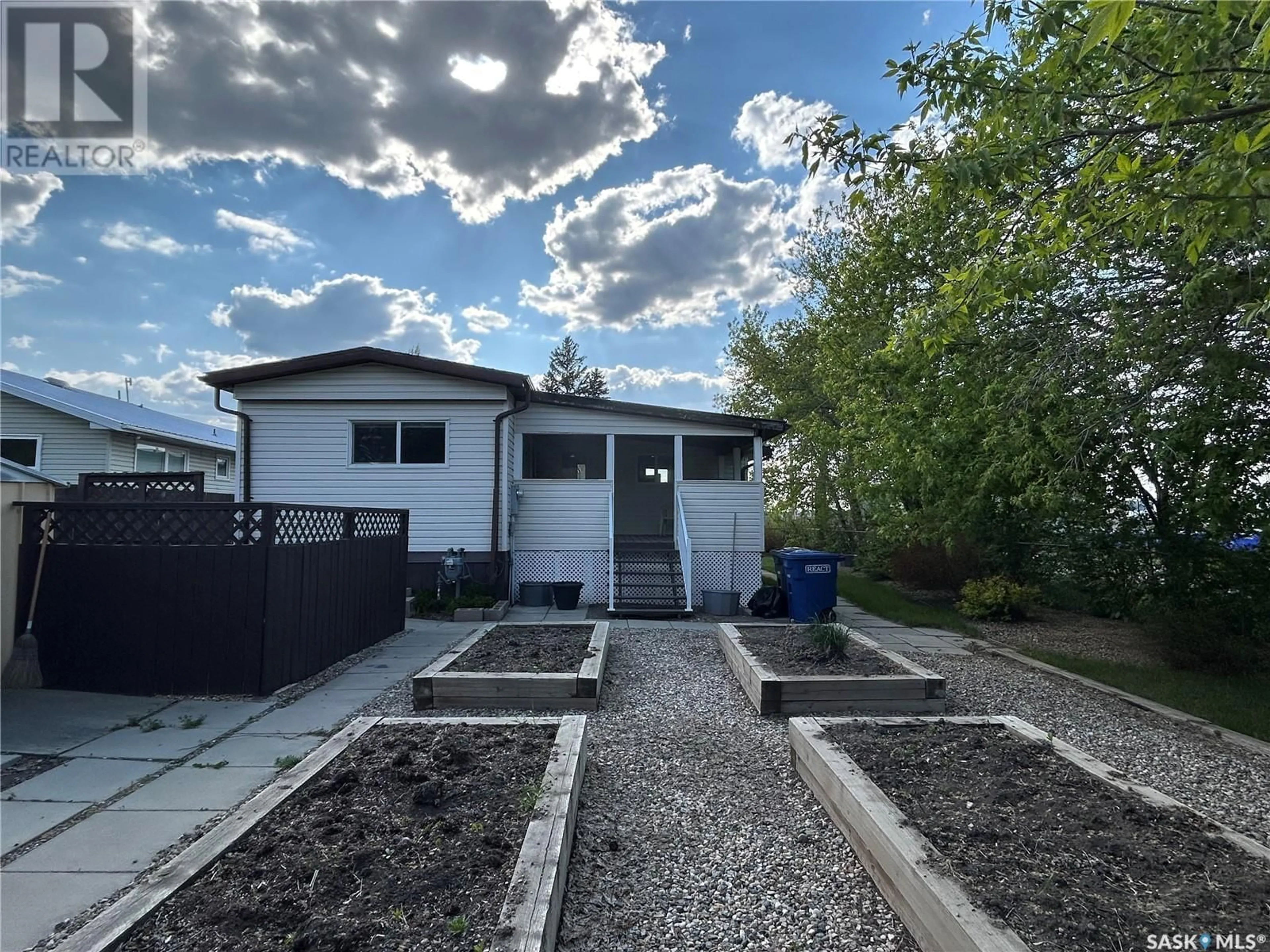 A pic from outside/outdoor area/front of a property/back of a property/a pic from drone, street for 238 13TH STREET, Humboldt Saskatchewan S0K2A0