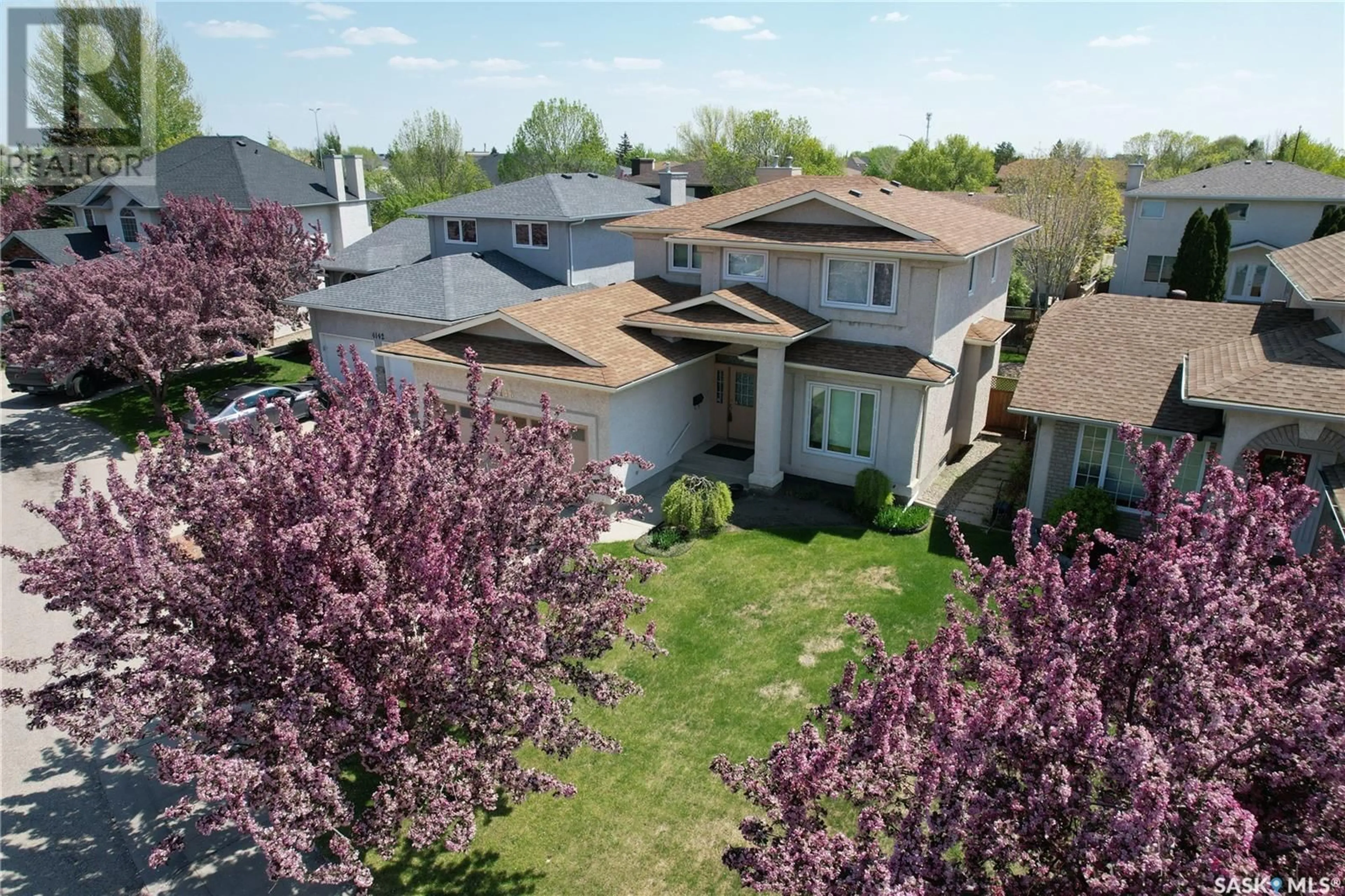 A pic from outside/outdoor area/front of a property/back of a property/a pic from drone, street for 4146 WASCANA RIDGE PLACE, Regina Saskatchewan S4V2S1