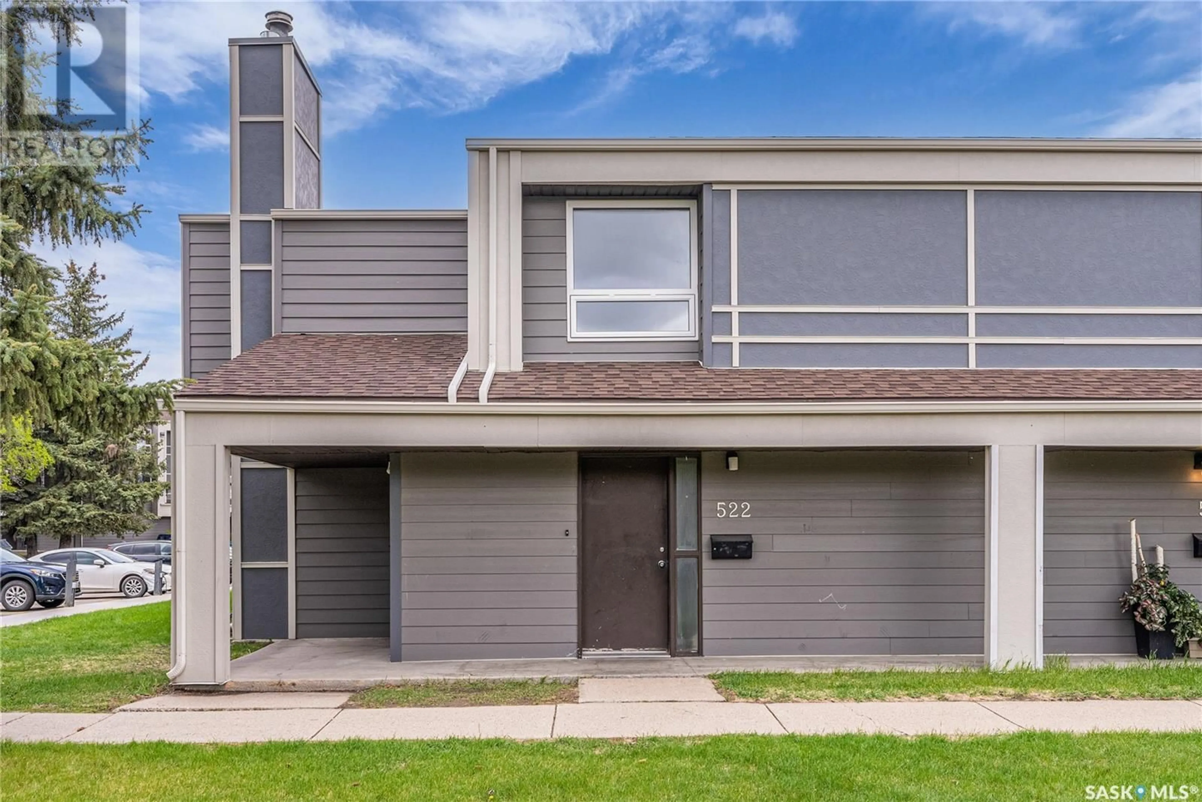 Home with vinyl exterior material, street for 510 - 522 PRAIRIE AVENUE, Saskatoon Saskatchewan S7N2V4
