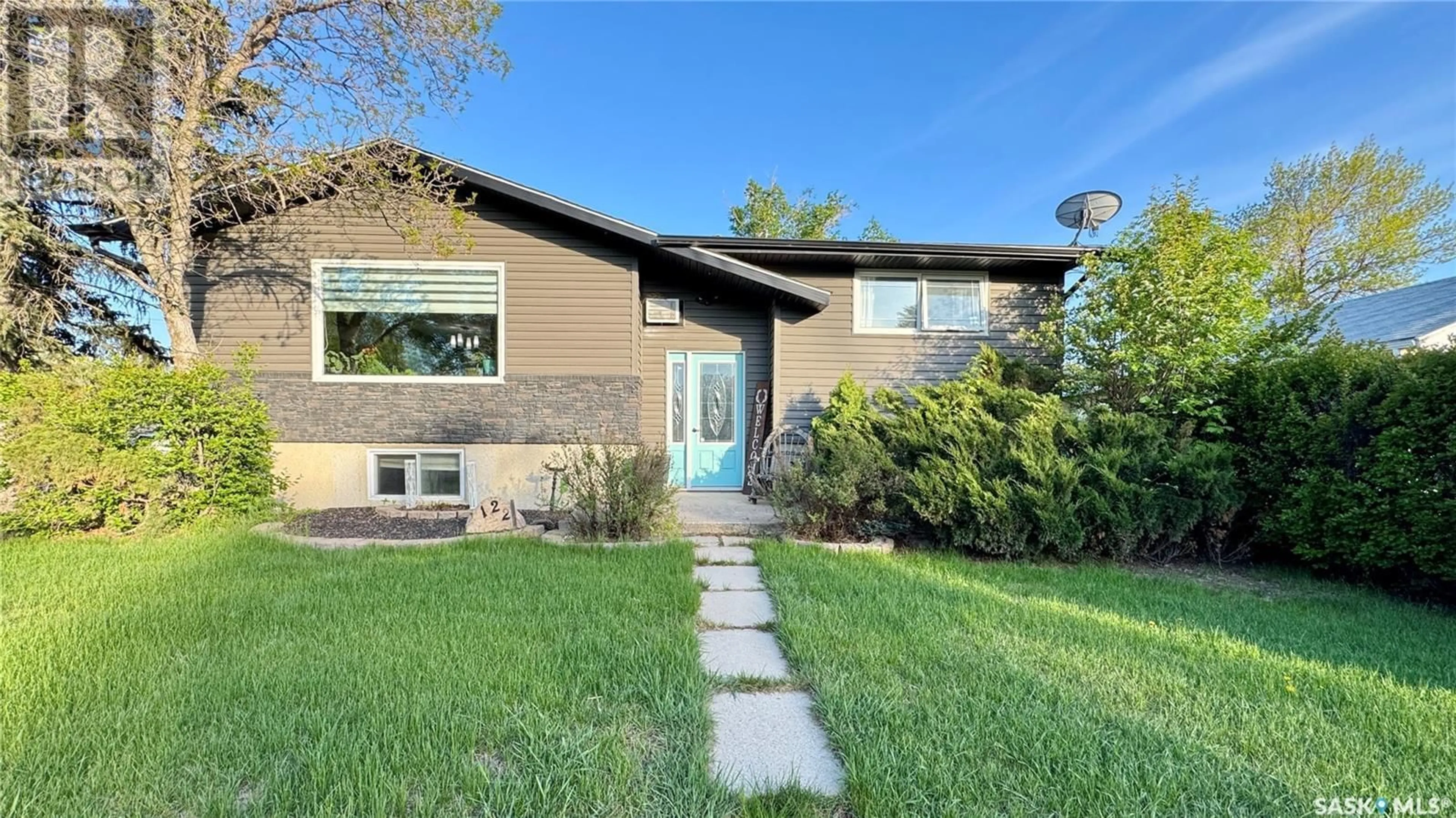 Home with brick exterior material, street for 122 HAMILTON STREET, Davidson Saskatchewan S0G1A0