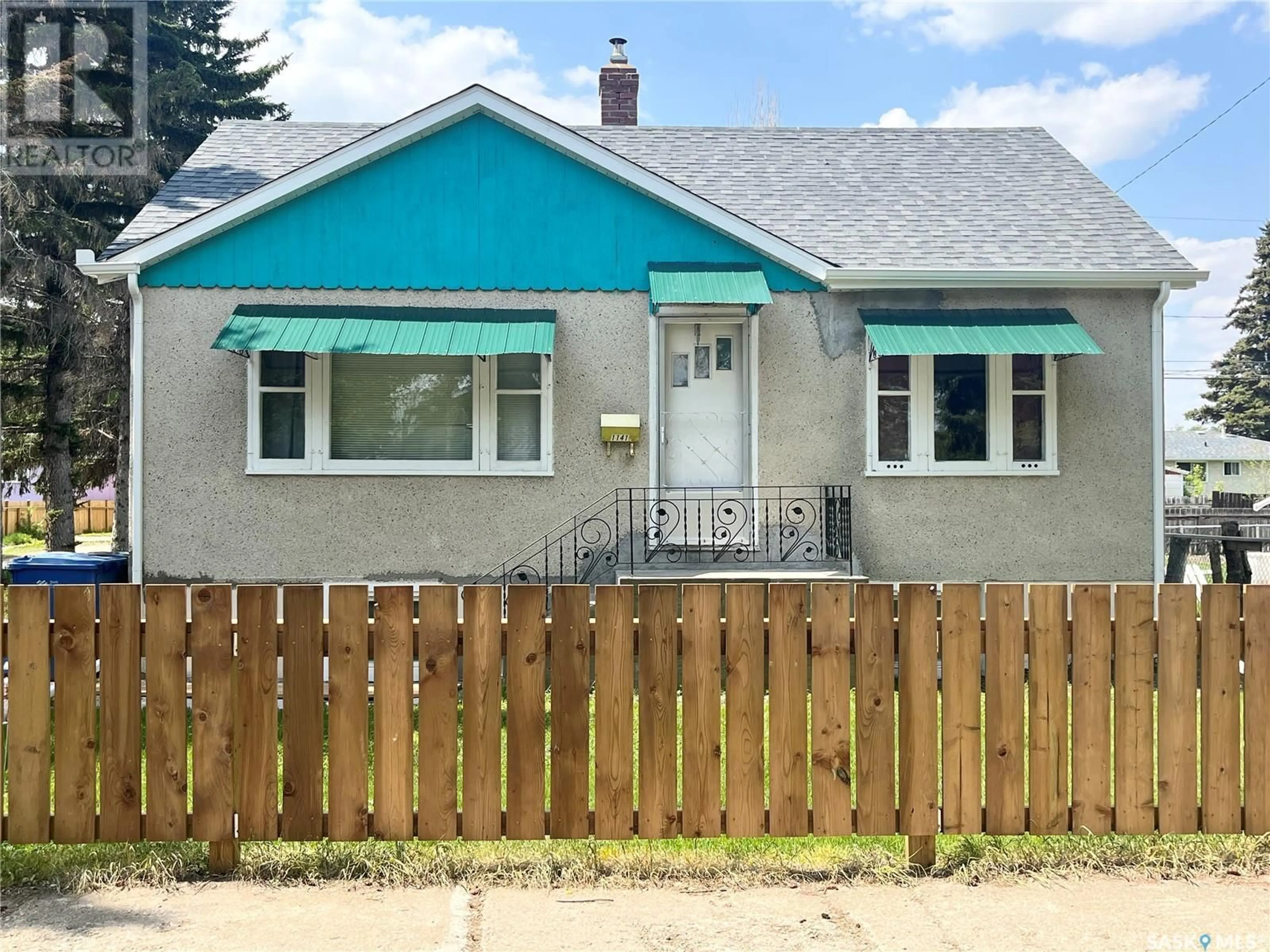 Home with vinyl exterior material, street for 1141 109TH STREET, North Battleford Saskatchewan S9A2E5