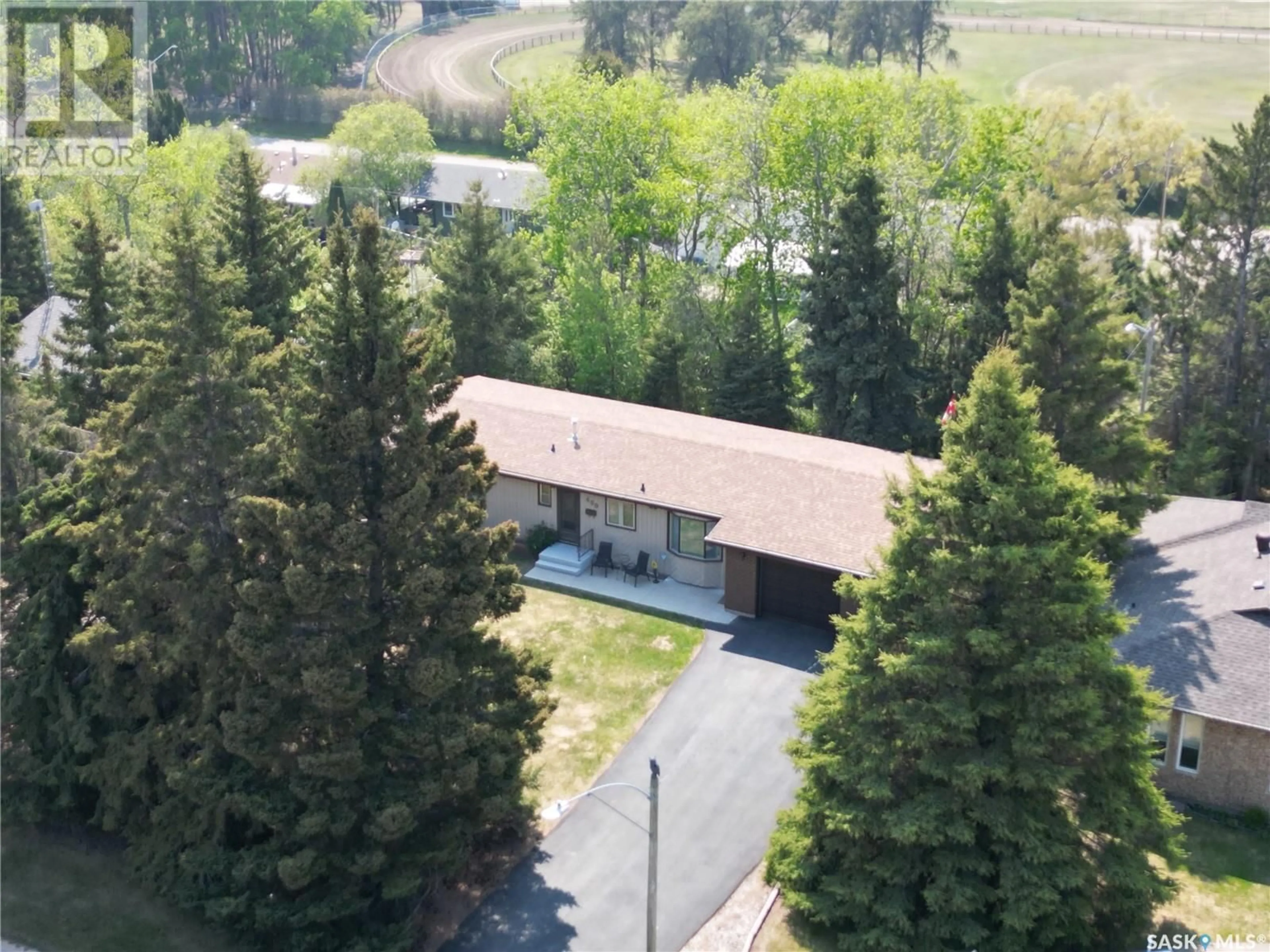 A pic from outside/outdoor area/front of a property/back of a property/a pic from drone, unknown for 400 MONTGOMERY DRIVE, Nipawin Saskatchewan S0E1E0