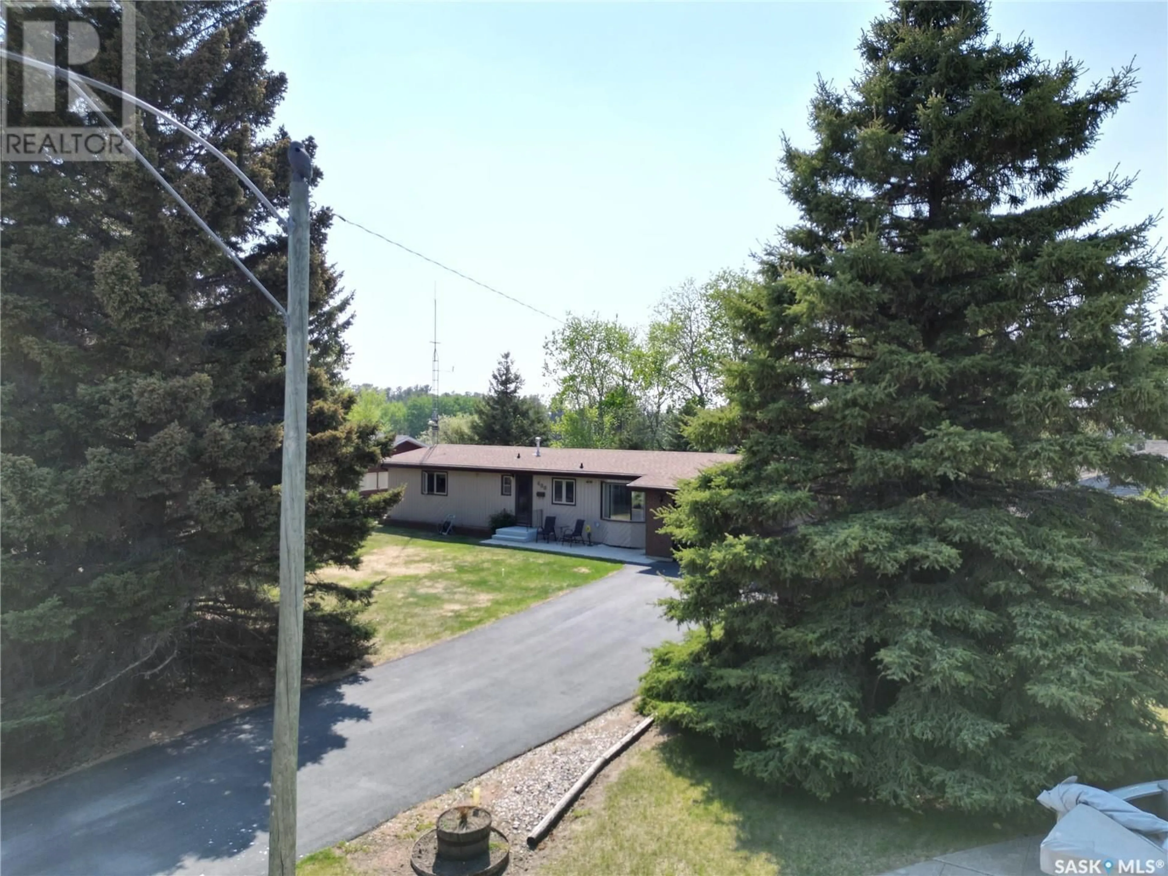 A pic from outside/outdoor area/front of a property/back of a property/a pic from drone, street for 400 MONTGOMERY DRIVE, Nipawin Saskatchewan S0E1E0