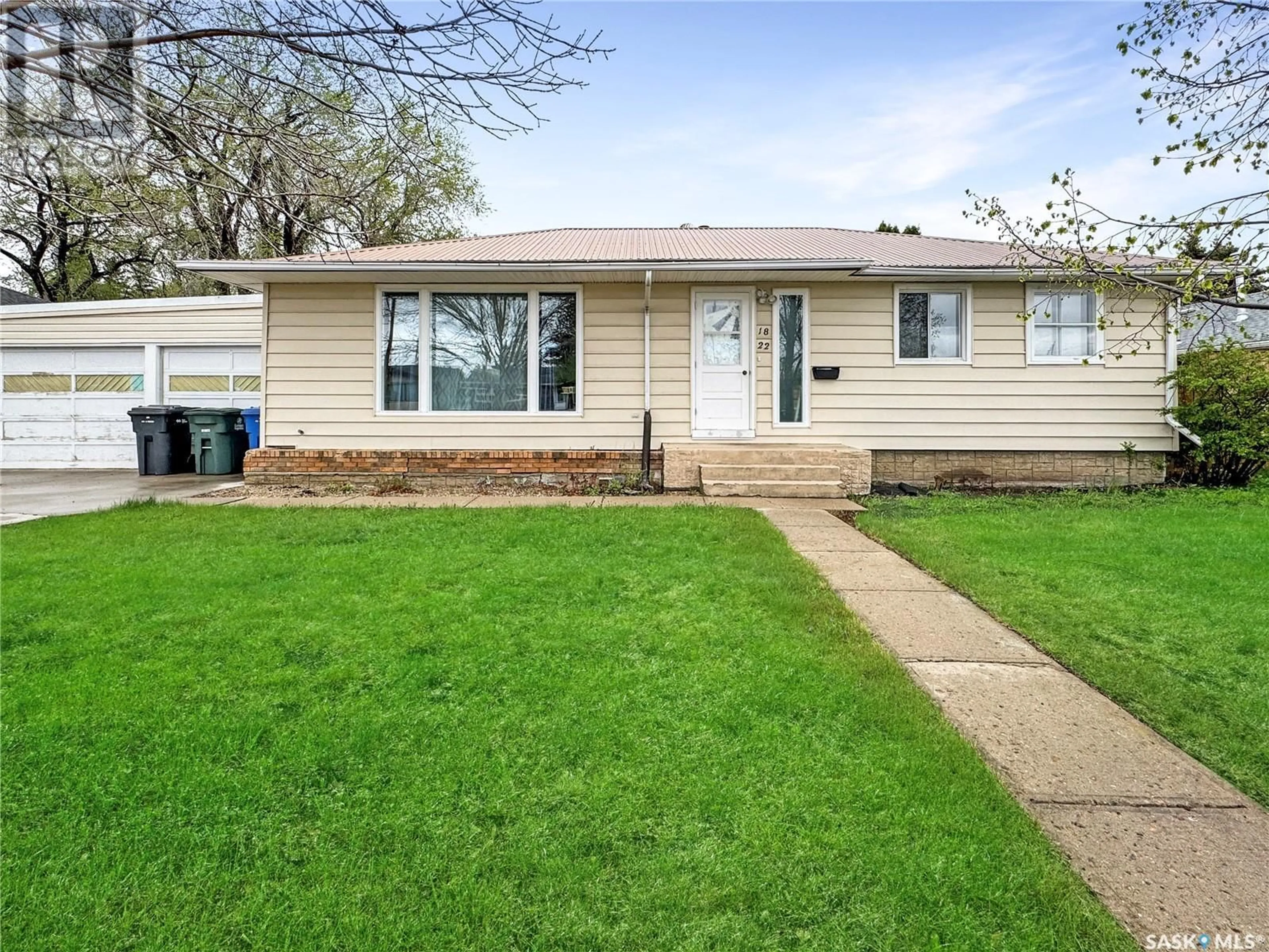 Home with vinyl exterior material, street for 1822 96TH STREET, North Battleford Saskatchewan S9A0J2