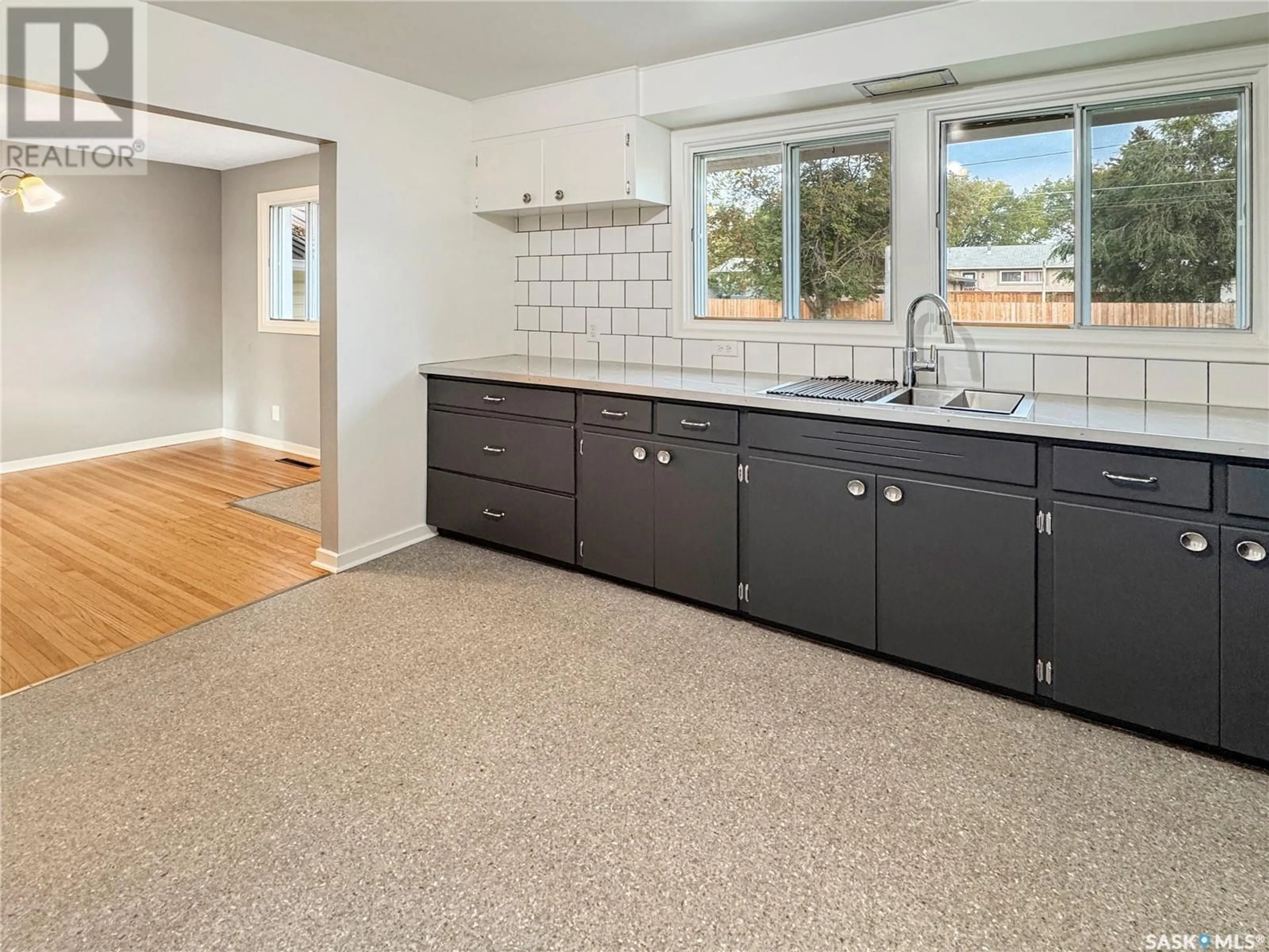 Open concept kitchen, ceramic/tile floor for 1822 96TH STREET, North Battleford Saskatchewan S9A0J2