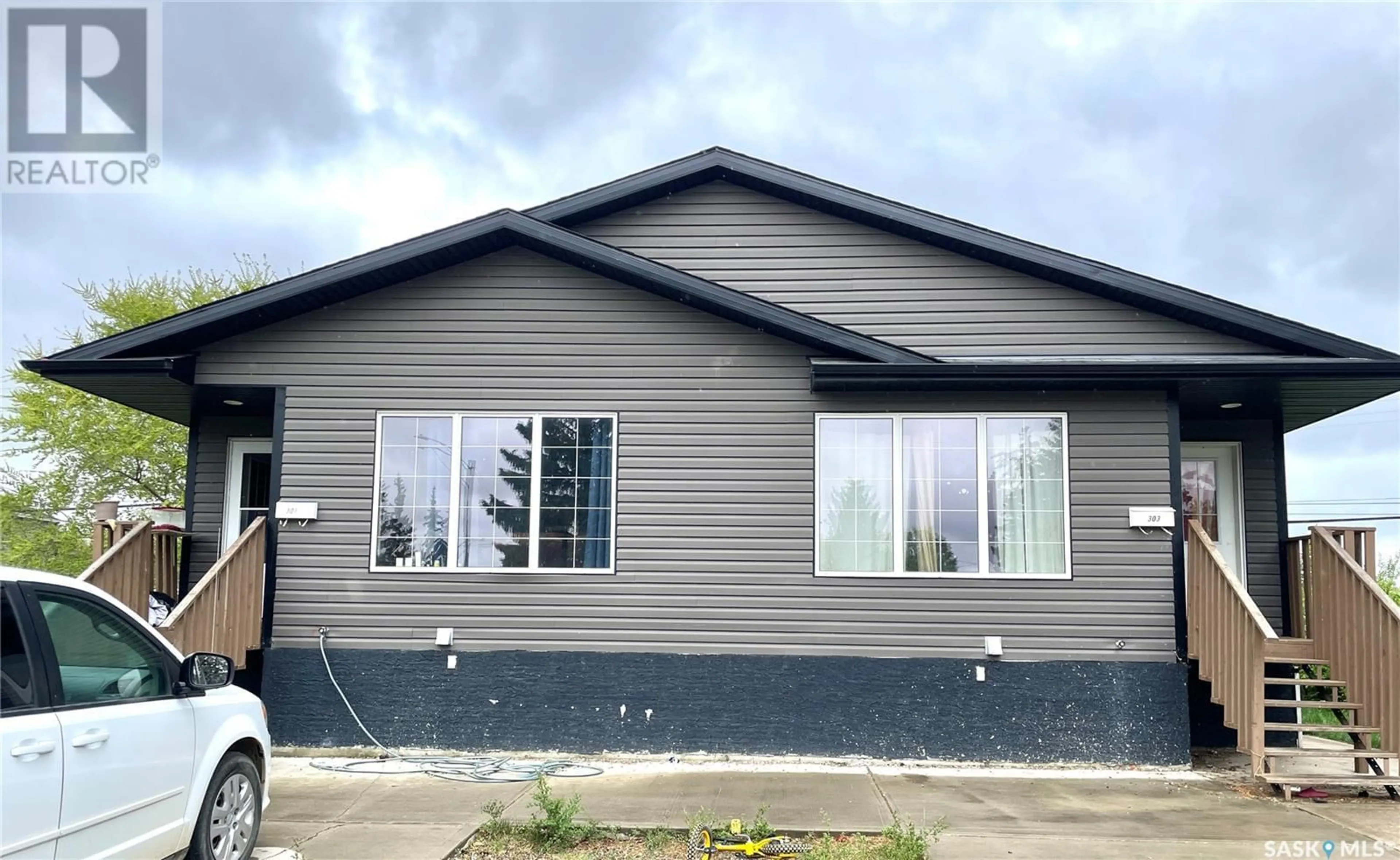 Home with vinyl exterior material, building for 301/303 30TH STREET, Battleford Saskatchewan S0M0E0