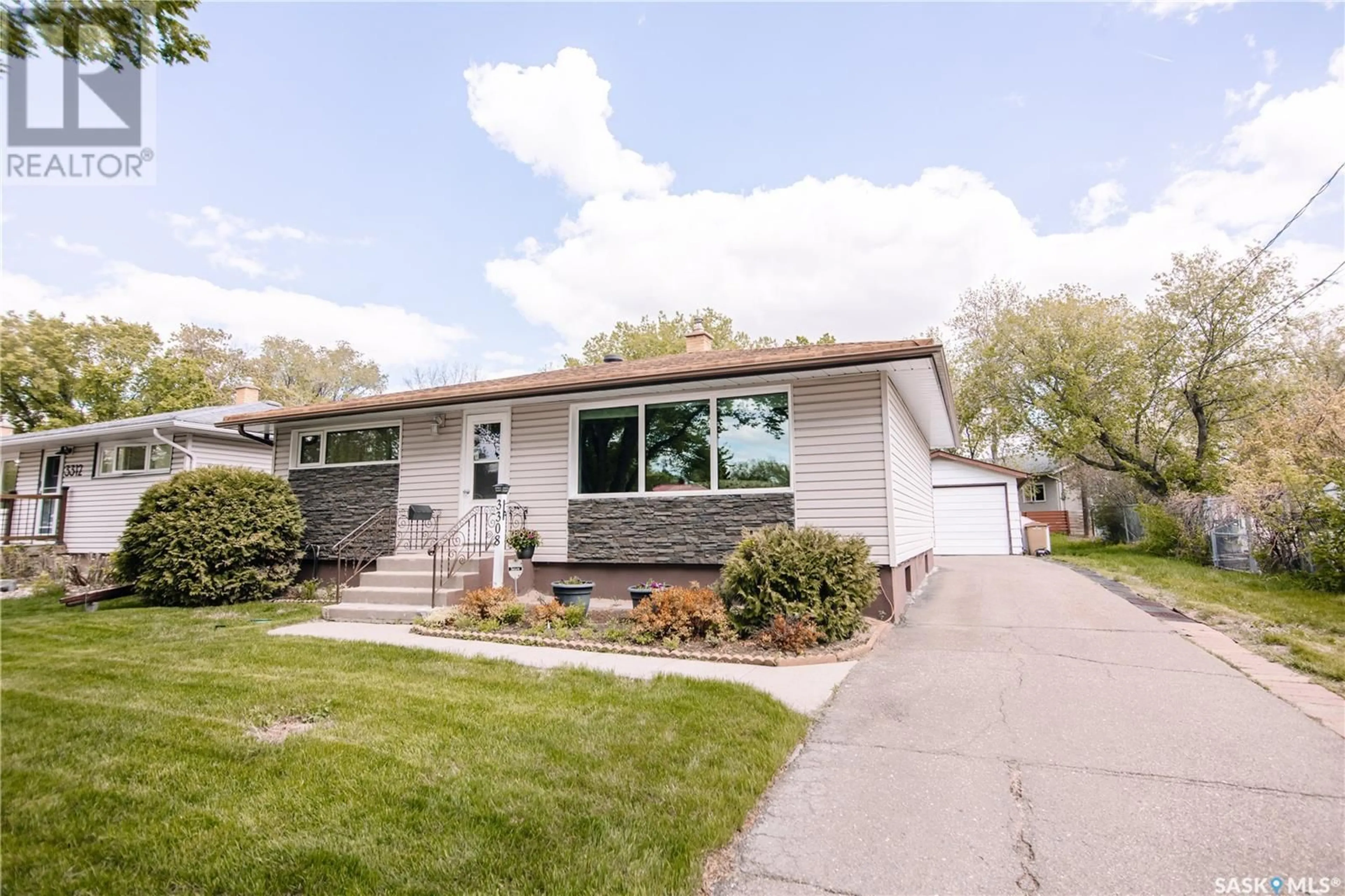 Home with vinyl exterior material, street for 3308 AVONHURST DRIVE, Regina Saskatchewan S4R3K1