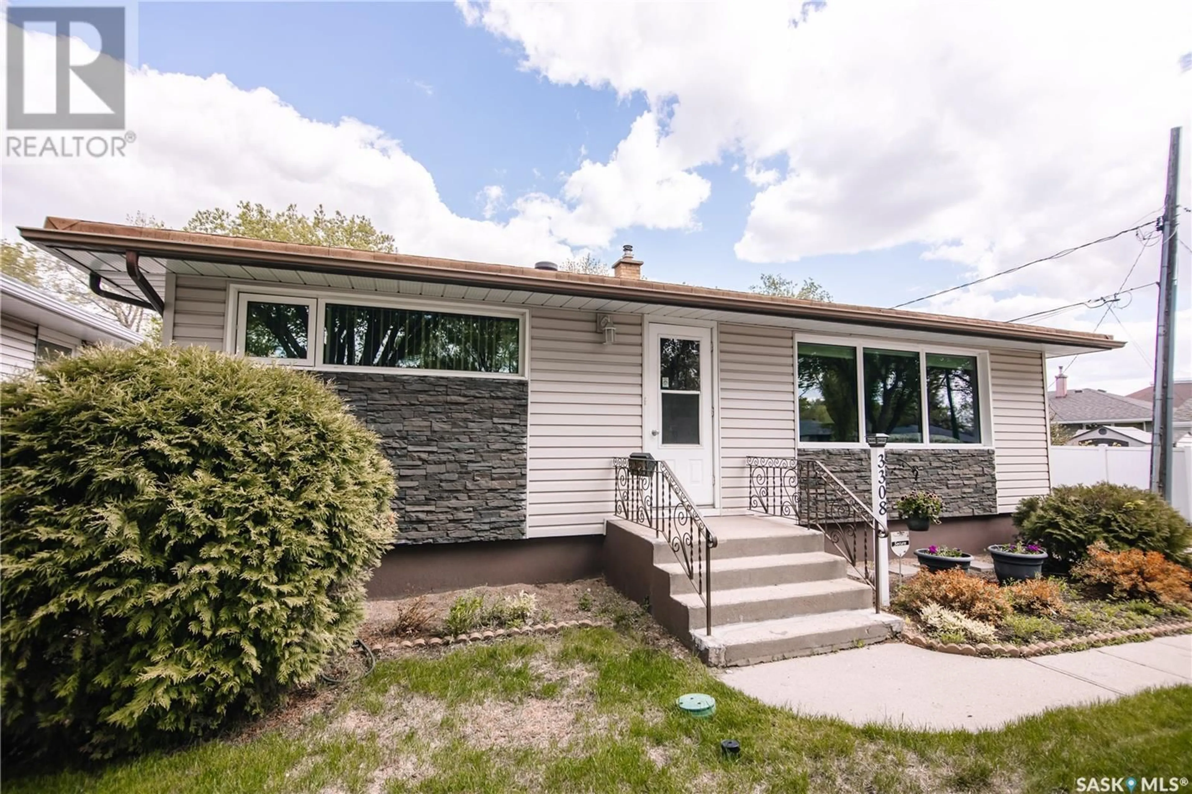Home with vinyl exterior material, street for 3308 AVONHURST DRIVE, Regina Saskatchewan S4R3K1
