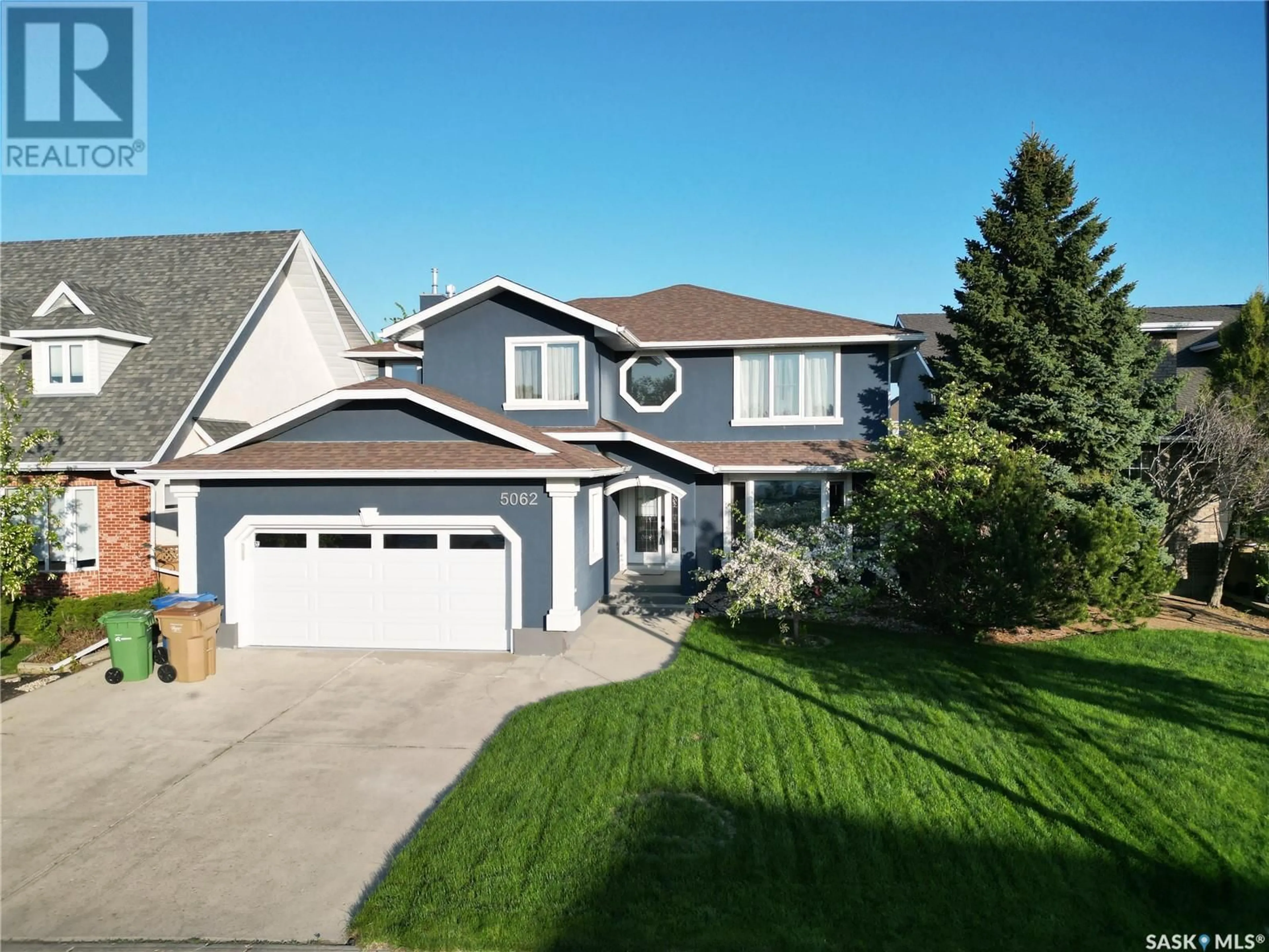 Home with vinyl exterior material, street for 5062 WASCANA VISTA COURT, Regina Saskatchewan S4V2S2