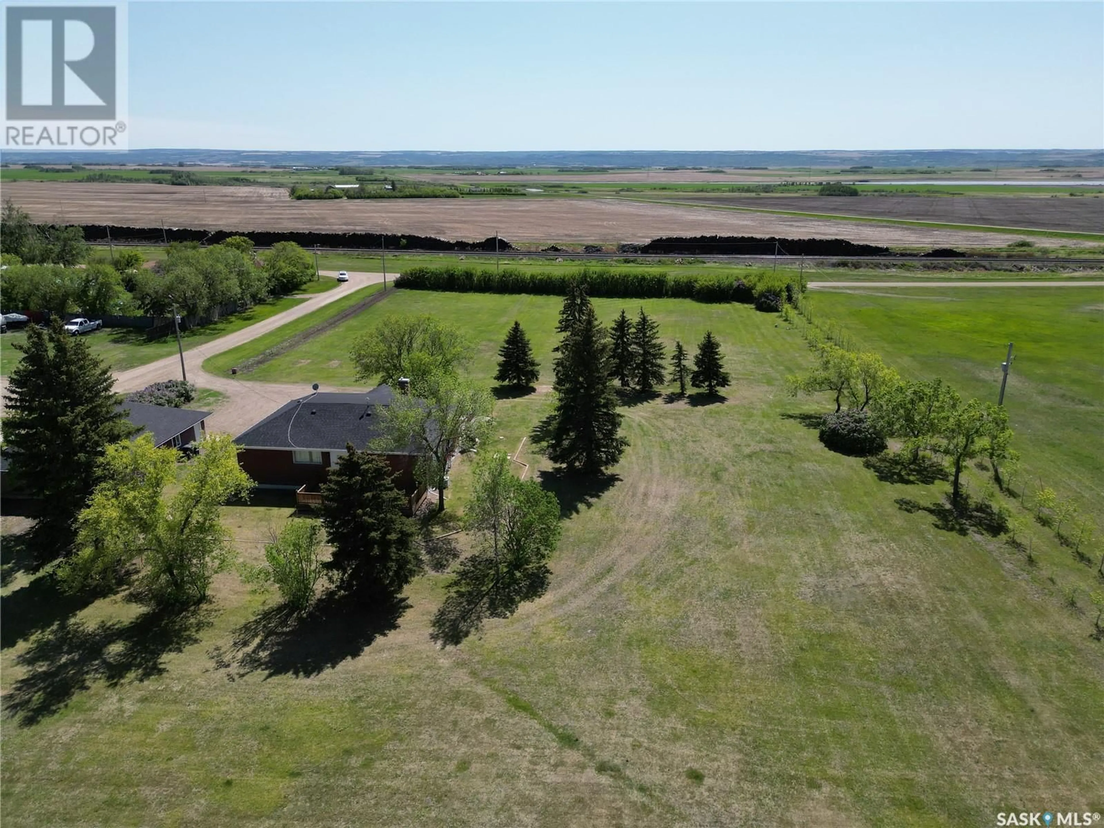 A pic from outside/outdoor area/front of a property/back of a property/a pic from drone, water/lake/river/ocean view for 106 2ND STREET, Denholm Saskatchewan S0M0R0