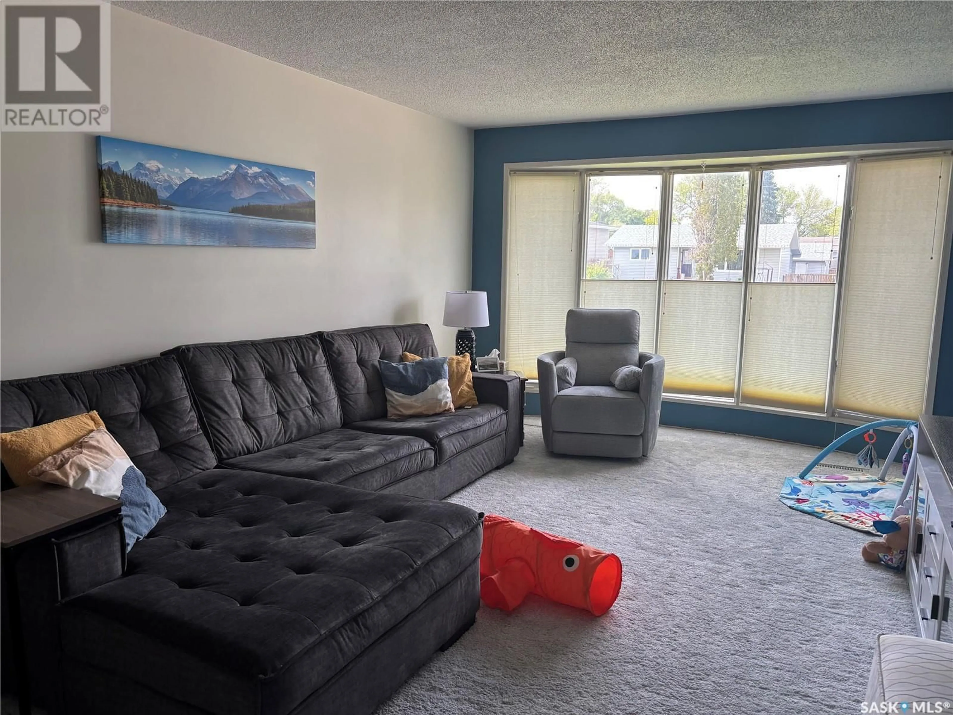 Living room with furniture, unknown for 601 2ND AVENUE, Swift Current Saskatchewan S9H3J9