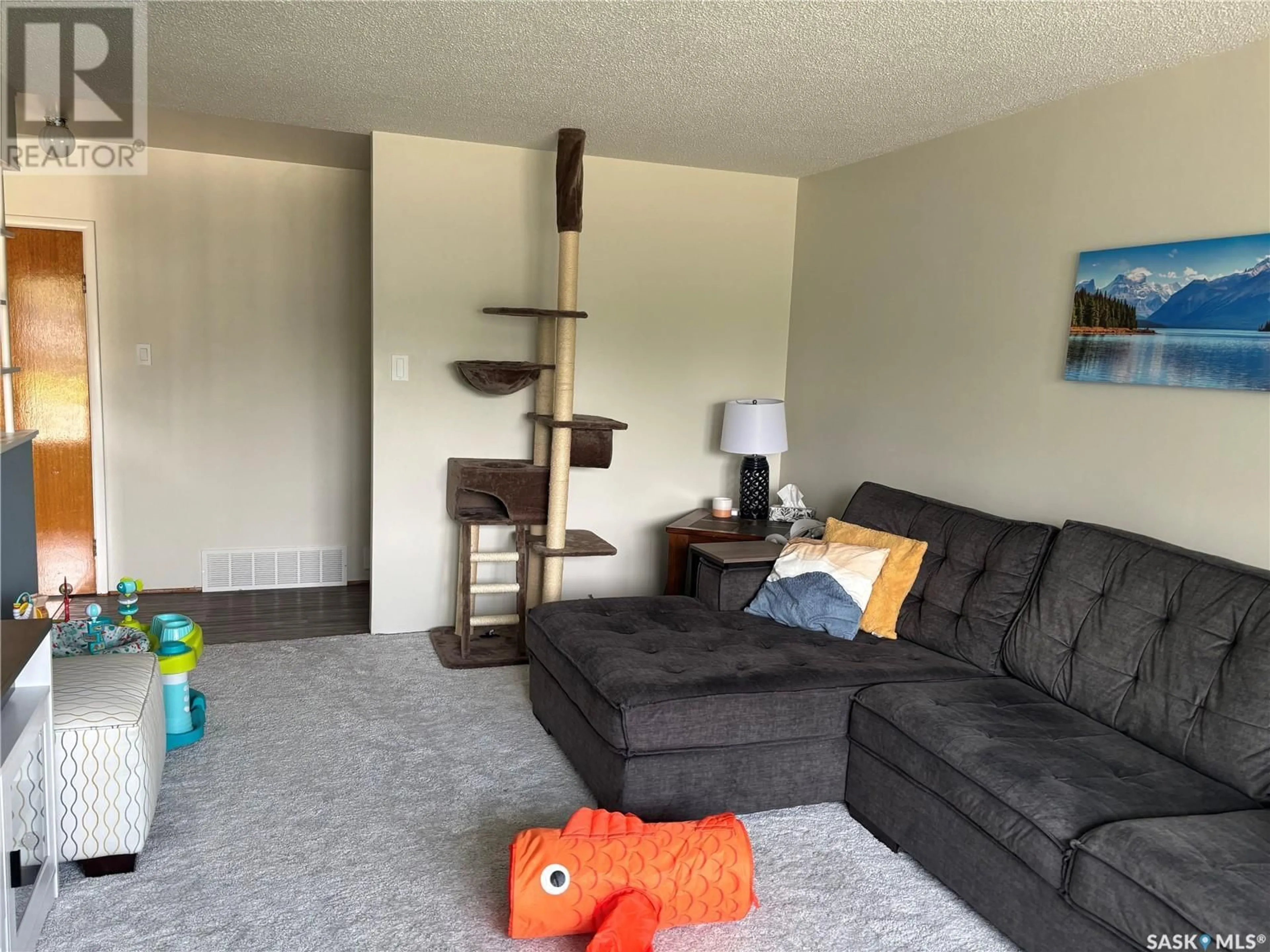 Living room with furniture, unknown for 601 2ND AVENUE, Swift Current Saskatchewan S9H3J9