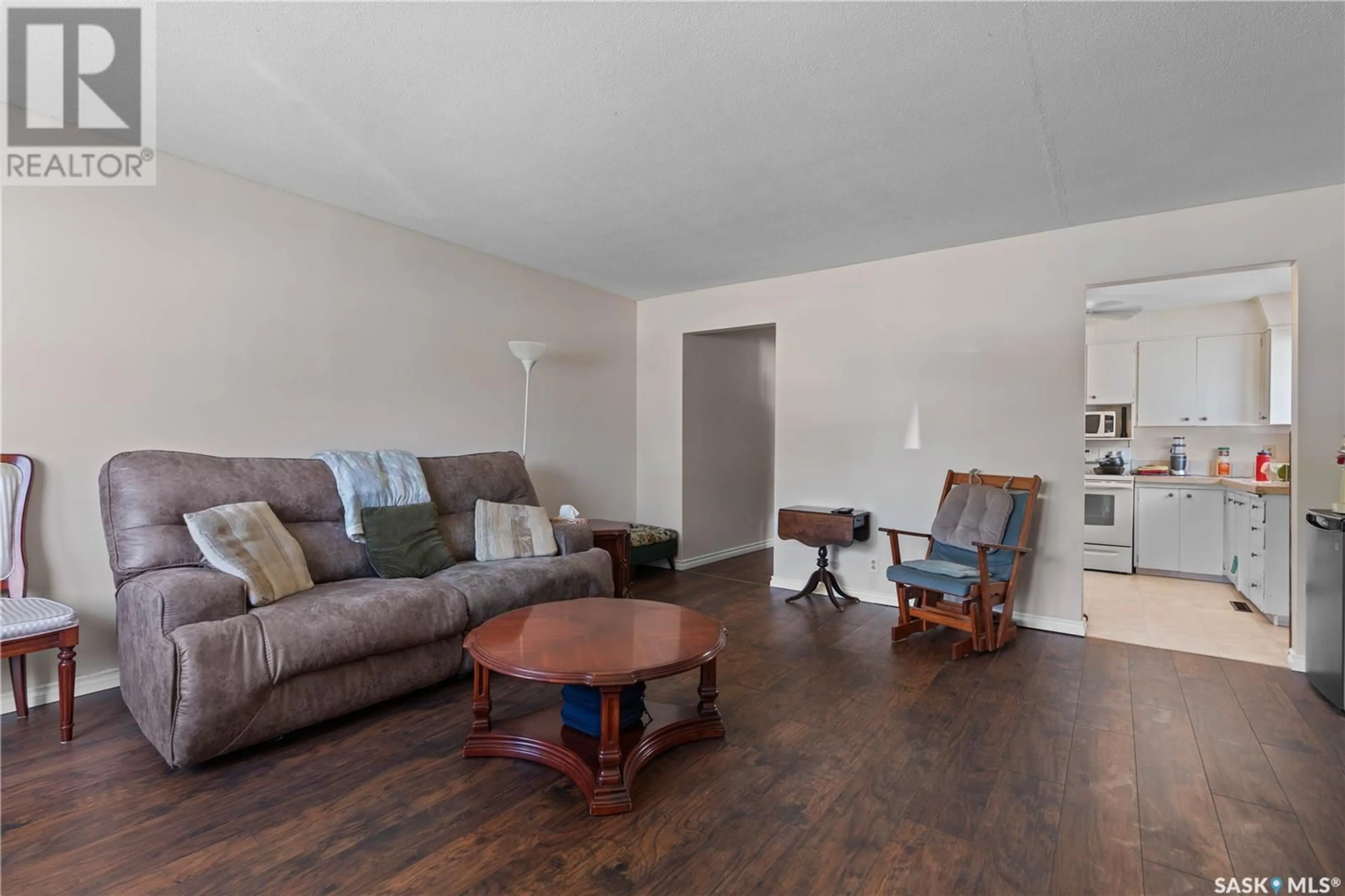 Living room with furniture, wood/laminate floor for 424 - 426 FROOM CRESCENT, Regina Saskatchewan S4N1T6
