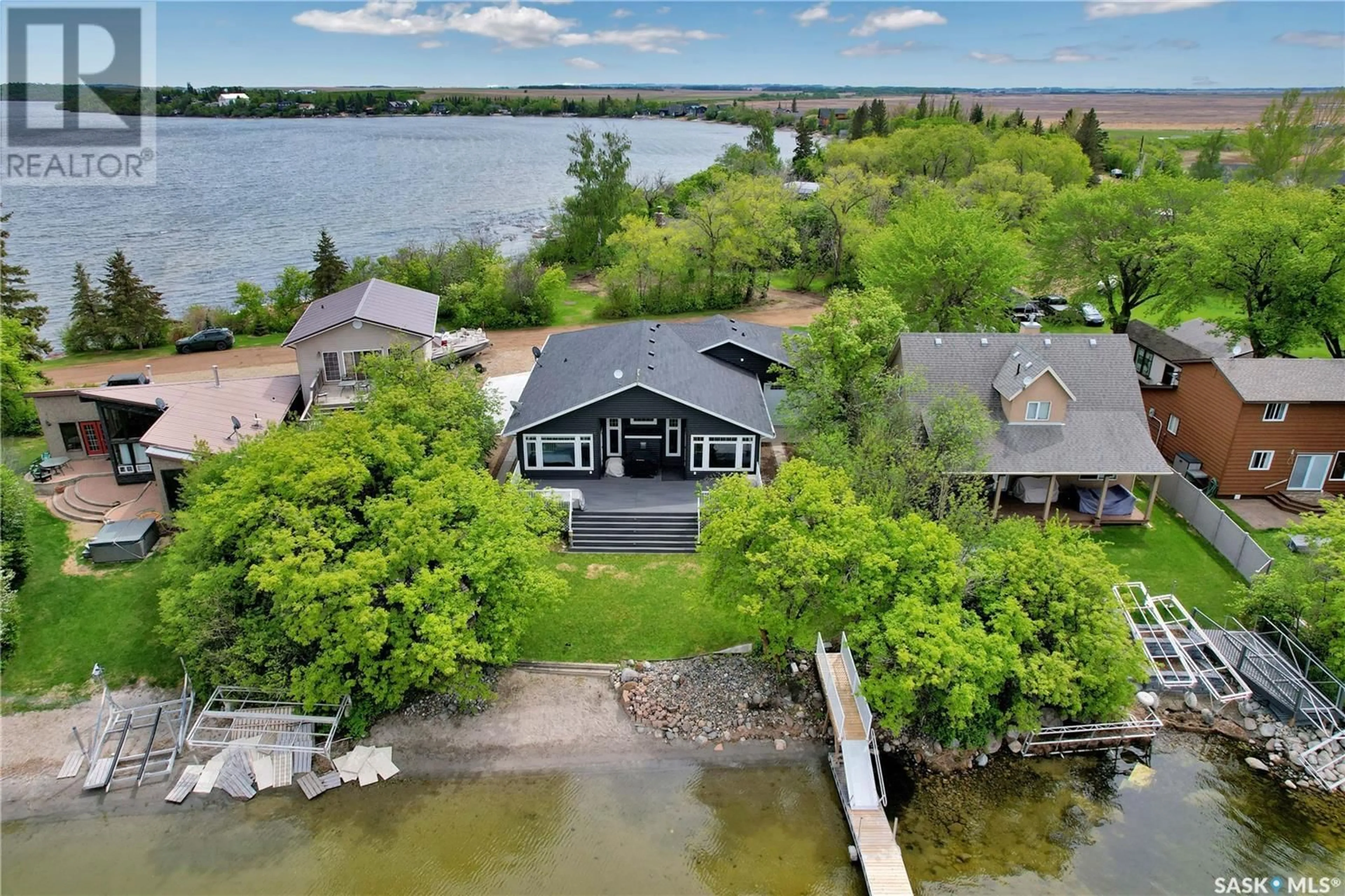 A pic from outside/outdoor area/front of a property/back of a property/a pic from drone, water/lake/river/ocean view for 36 FERRIE AVENUE, Murray Lake Saskatchewan S0M0X0