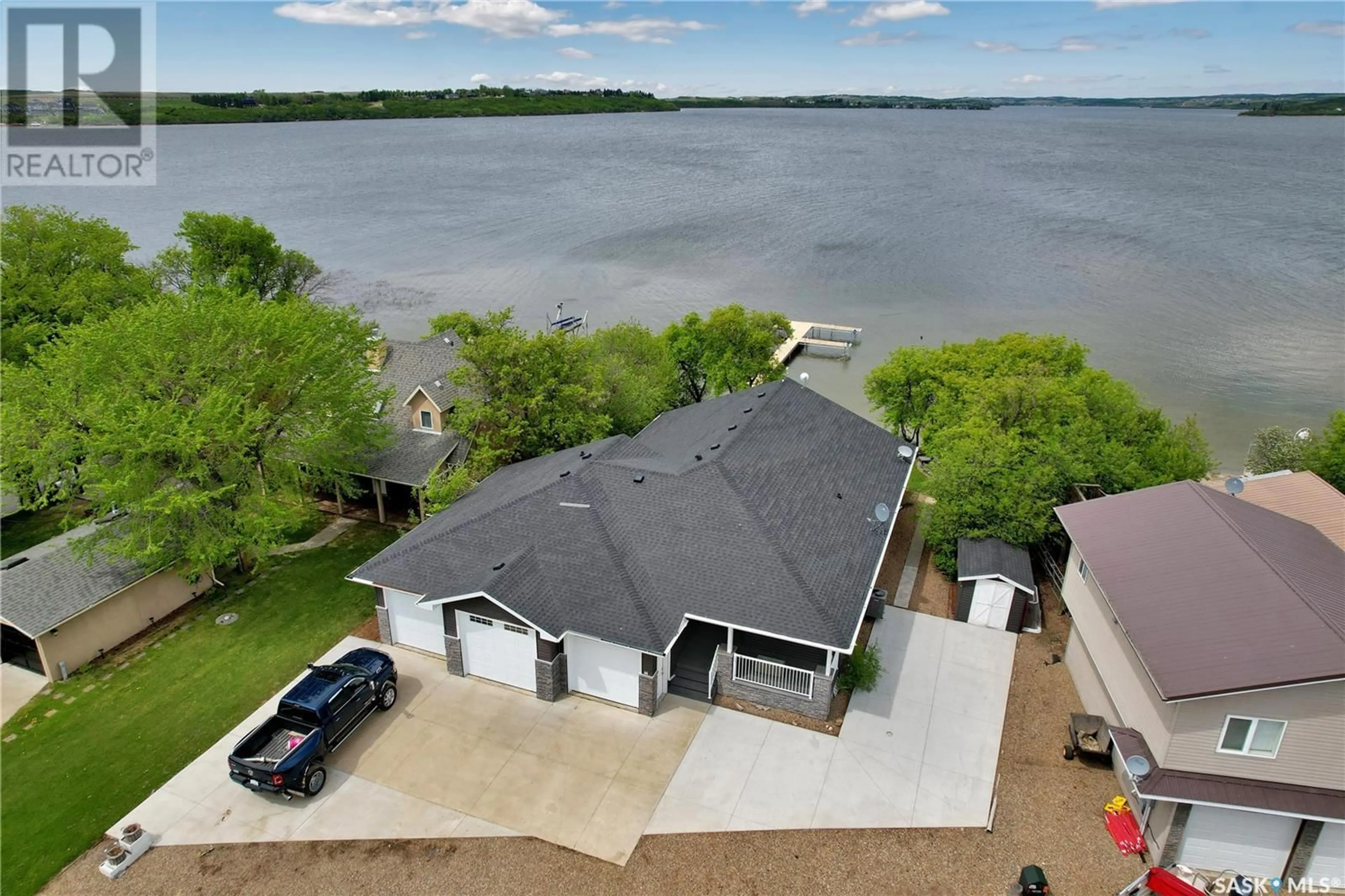 A pic from outside/outdoor area/front of a property/back of a property/a pic from drone, water/lake/river/ocean view for 36 FERRIE AVENUE, Murray Lake Saskatchewan S0M0X0