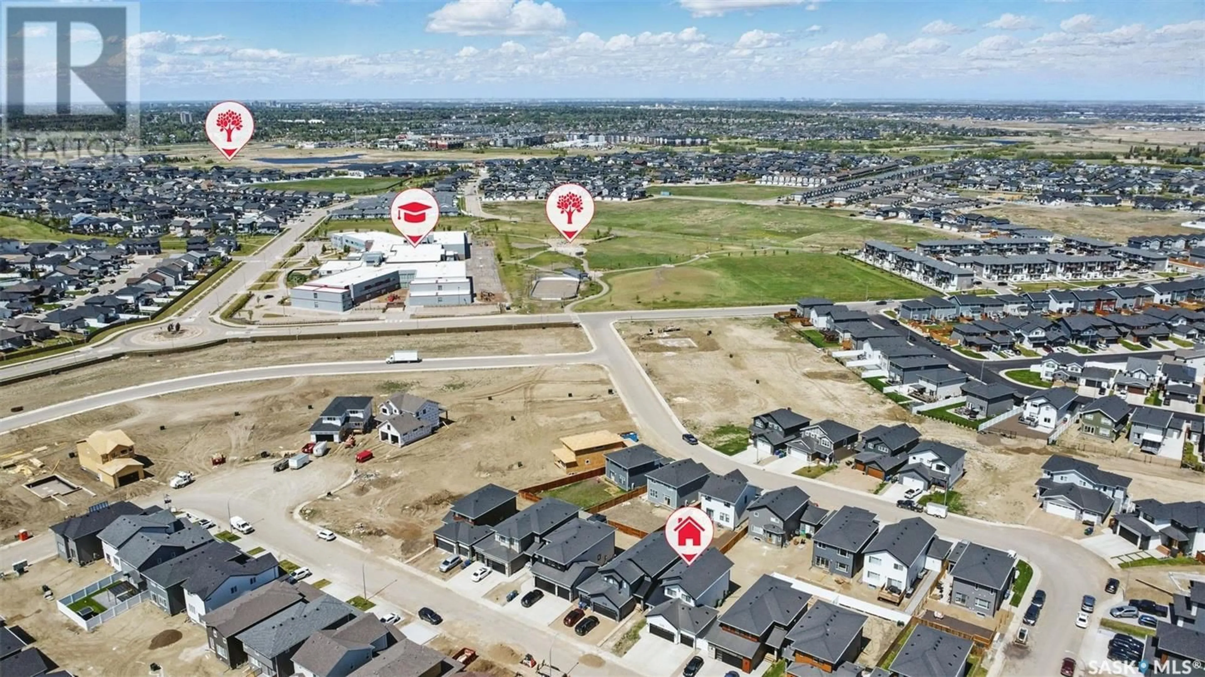 A pic from outside/outdoor area/front of a property/back of a property/a pic from drone, street for 315 DZIADYK BEND, Saskatoon Saskatchewan S7V1M5