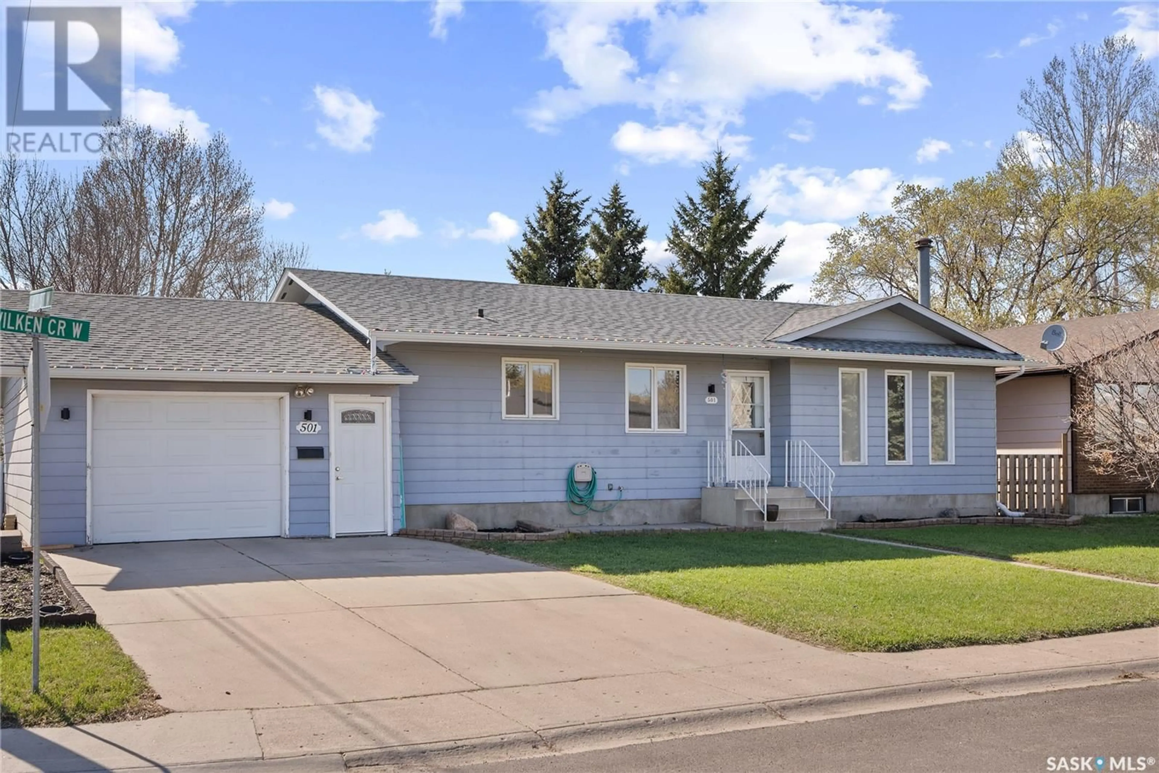 Home with vinyl exterior material, street for 501 WILKEN CRESCENT, Warman Saskatchewan S0K4S0