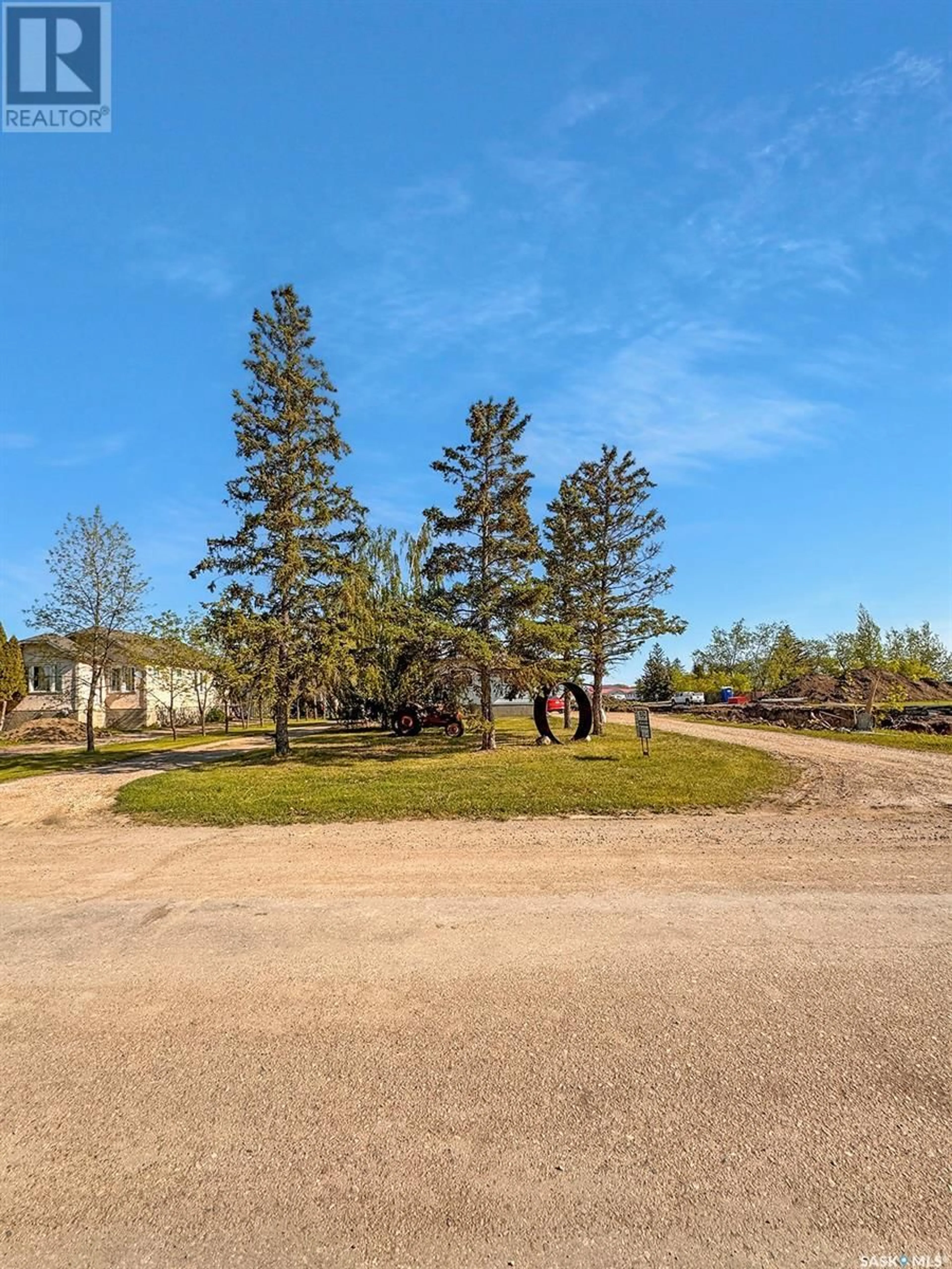 A pic from outside/outdoor area/front of a property/back of a property/a pic from drone, forest/trees view for 124 SOUTH SERVICE ROAD, Hague Saskatchewan S0K1X0