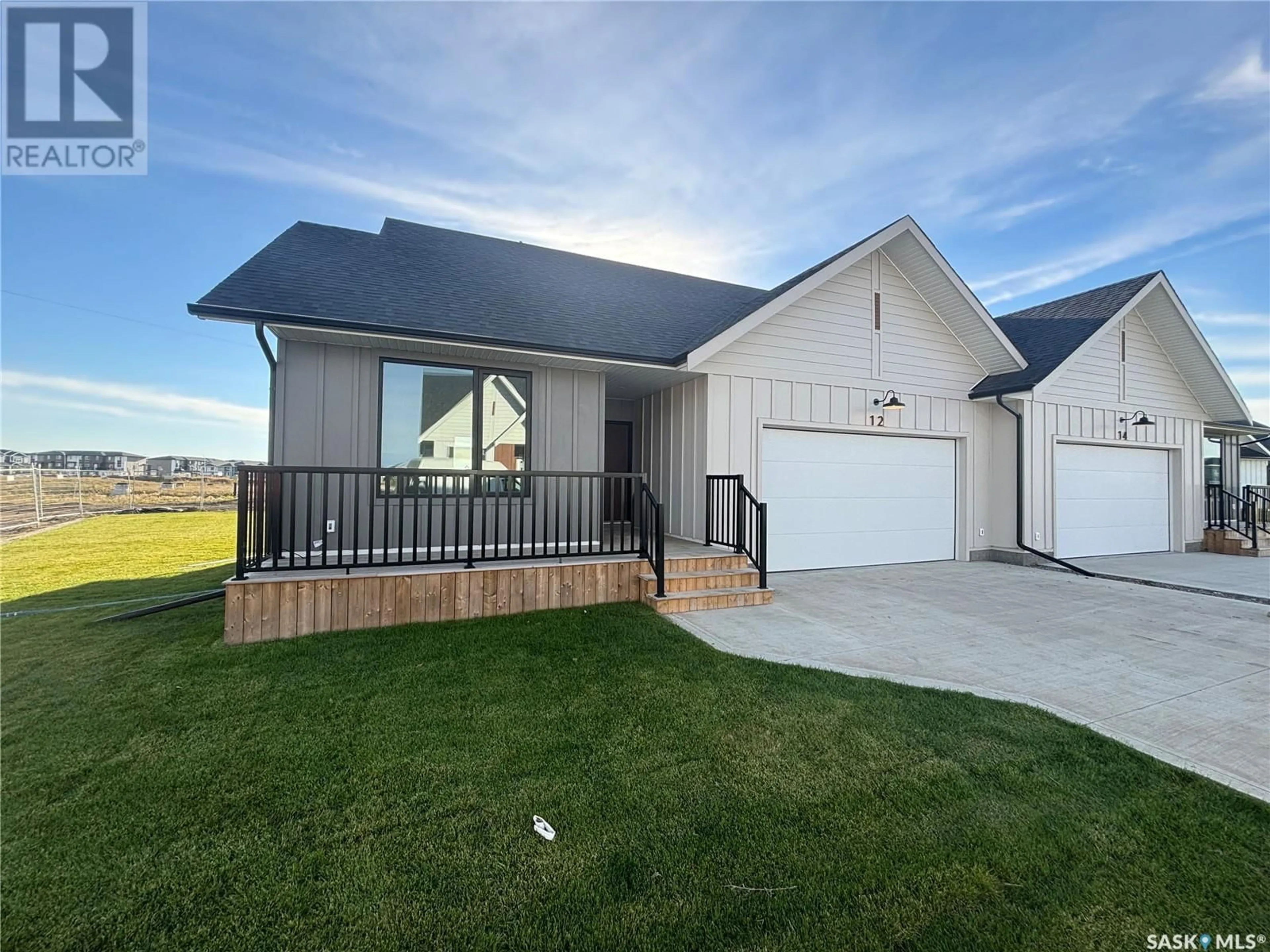 Home with vinyl exterior material, street for 31 105 HATHWAY CRESCENT, Saskatoon Saskatchewan S7V0P5