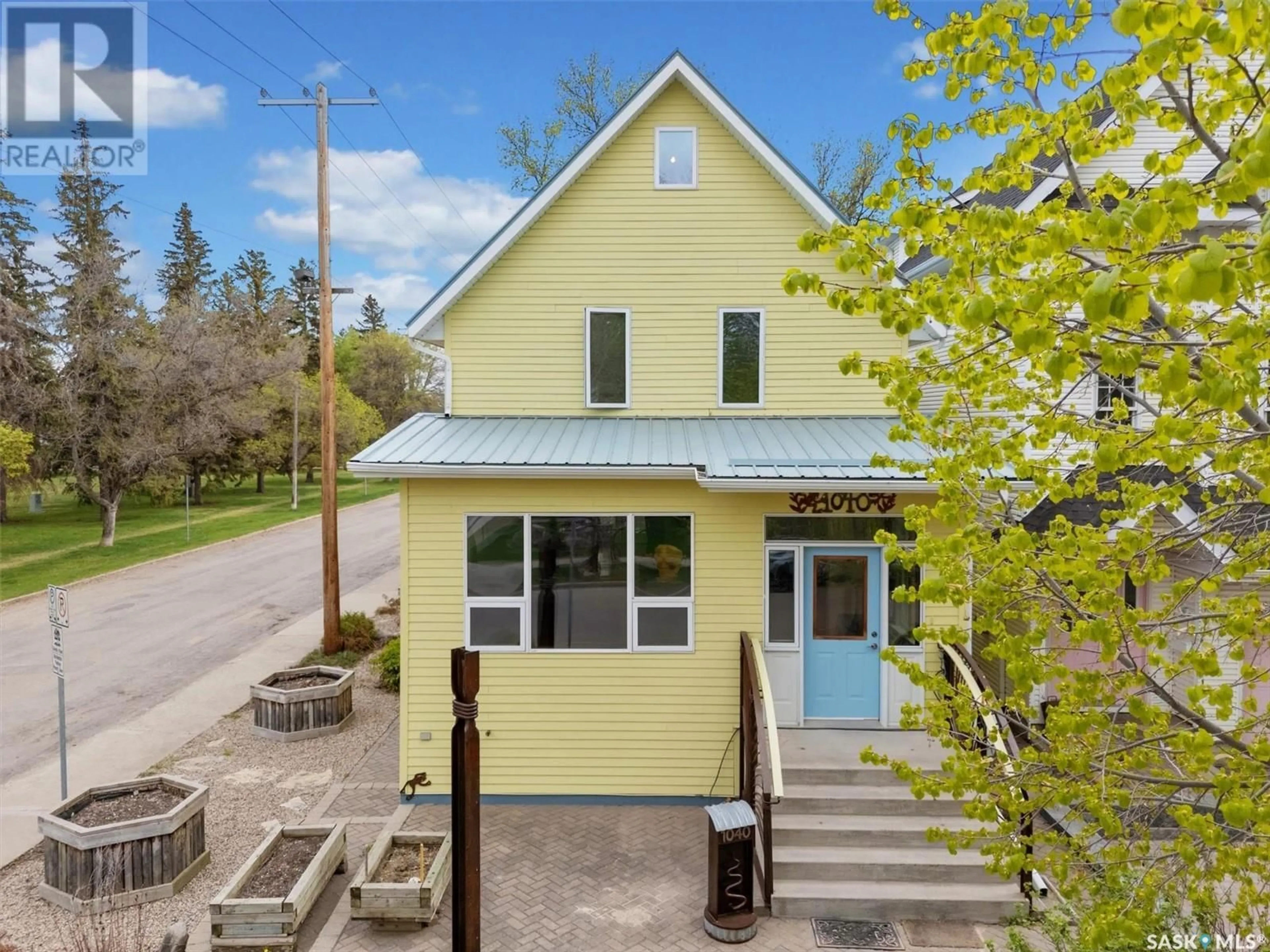 Home with vinyl exterior material, street for 1040 AIRD STREET, Saskatoon Saskatchewan S7N0T1