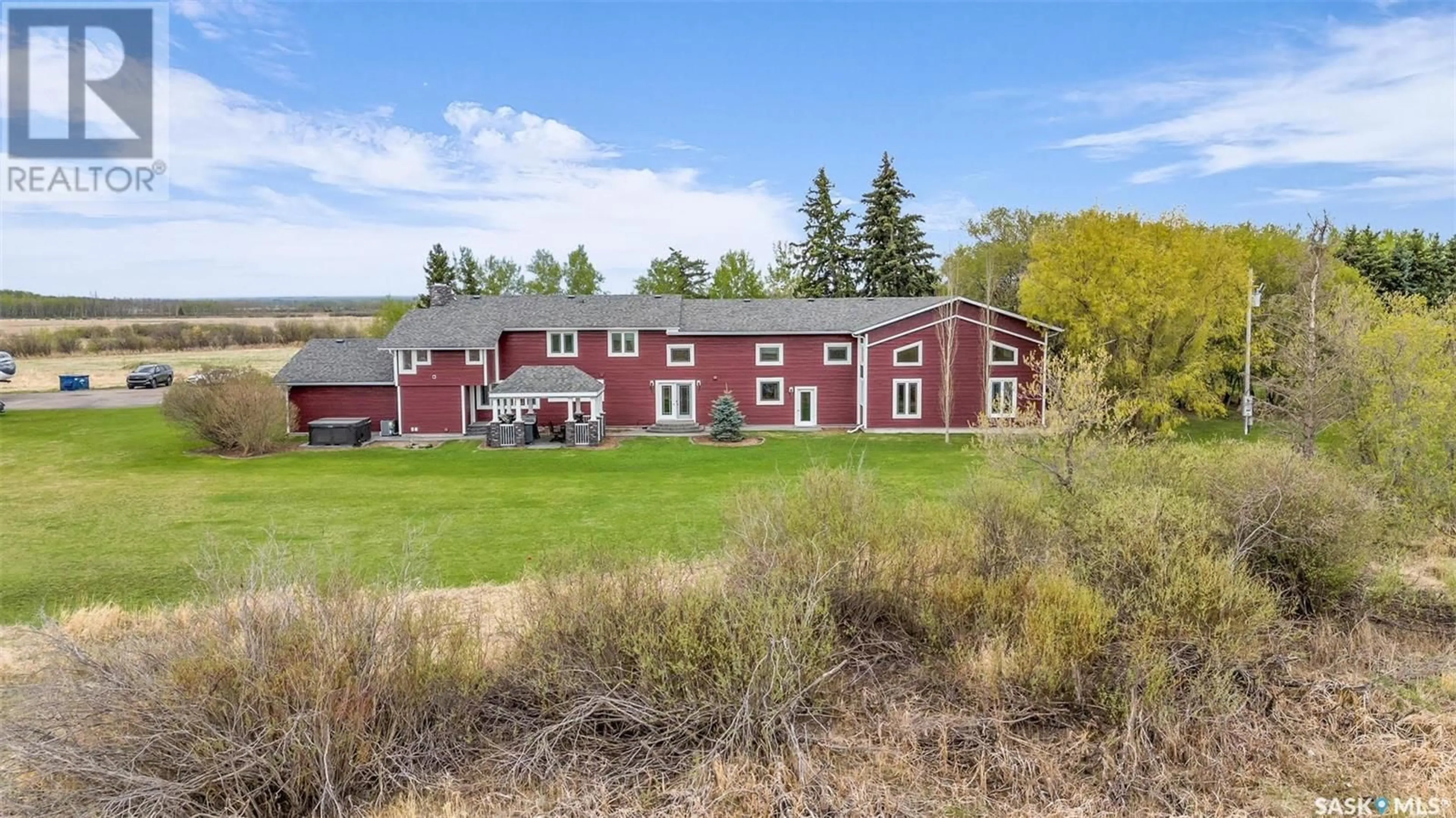 A pic from outside/outdoor area/front of a property/back of a property/a pic from drone, building for BACKWATER CREEK ACREAGE, Meadow Lake Rm No.588 Saskatchewan S9X1Z5