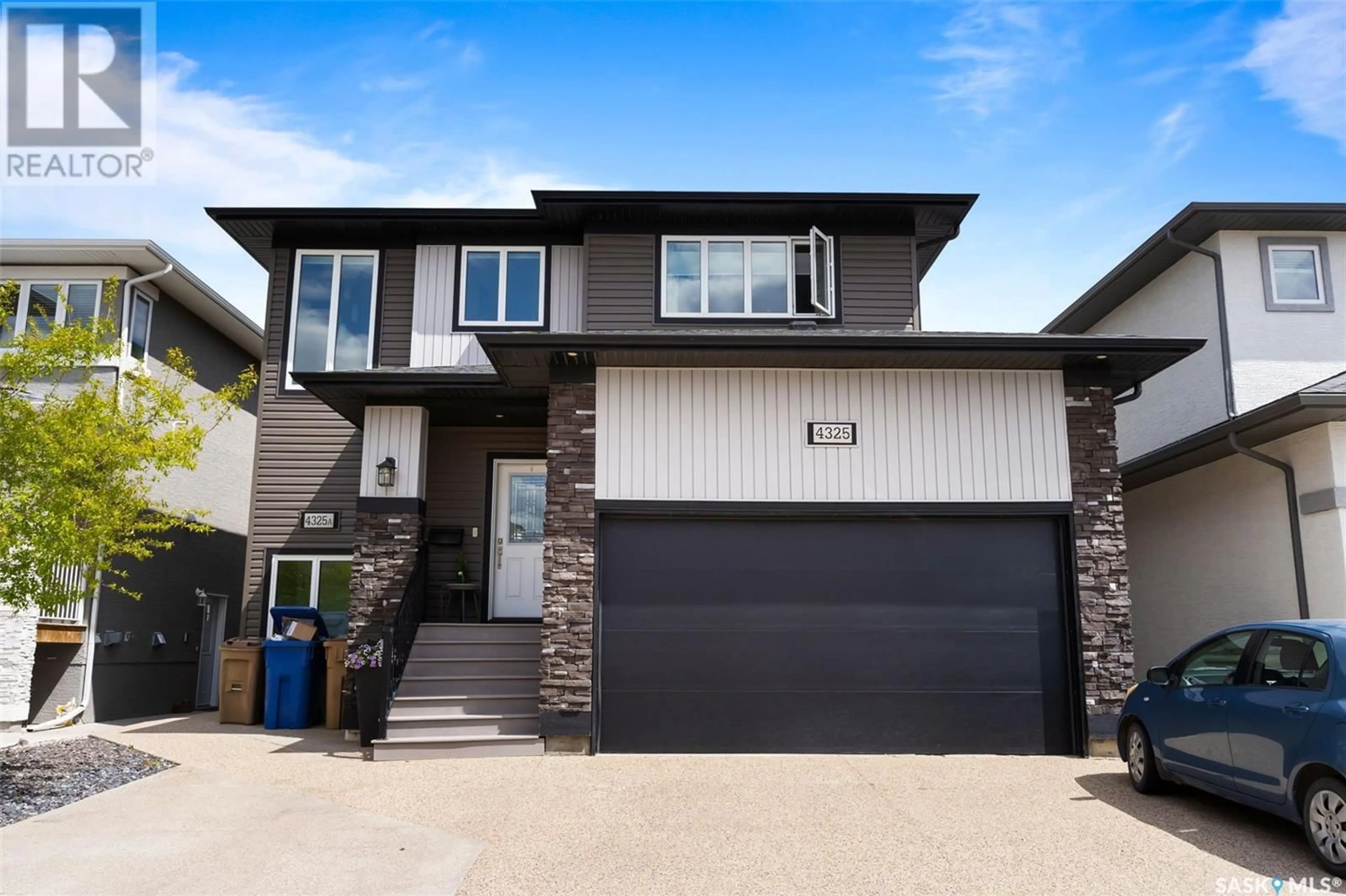 Home with vinyl exterior material, street for 4325 WAKELING STREET, Regina Saskatchewan S4W0L7