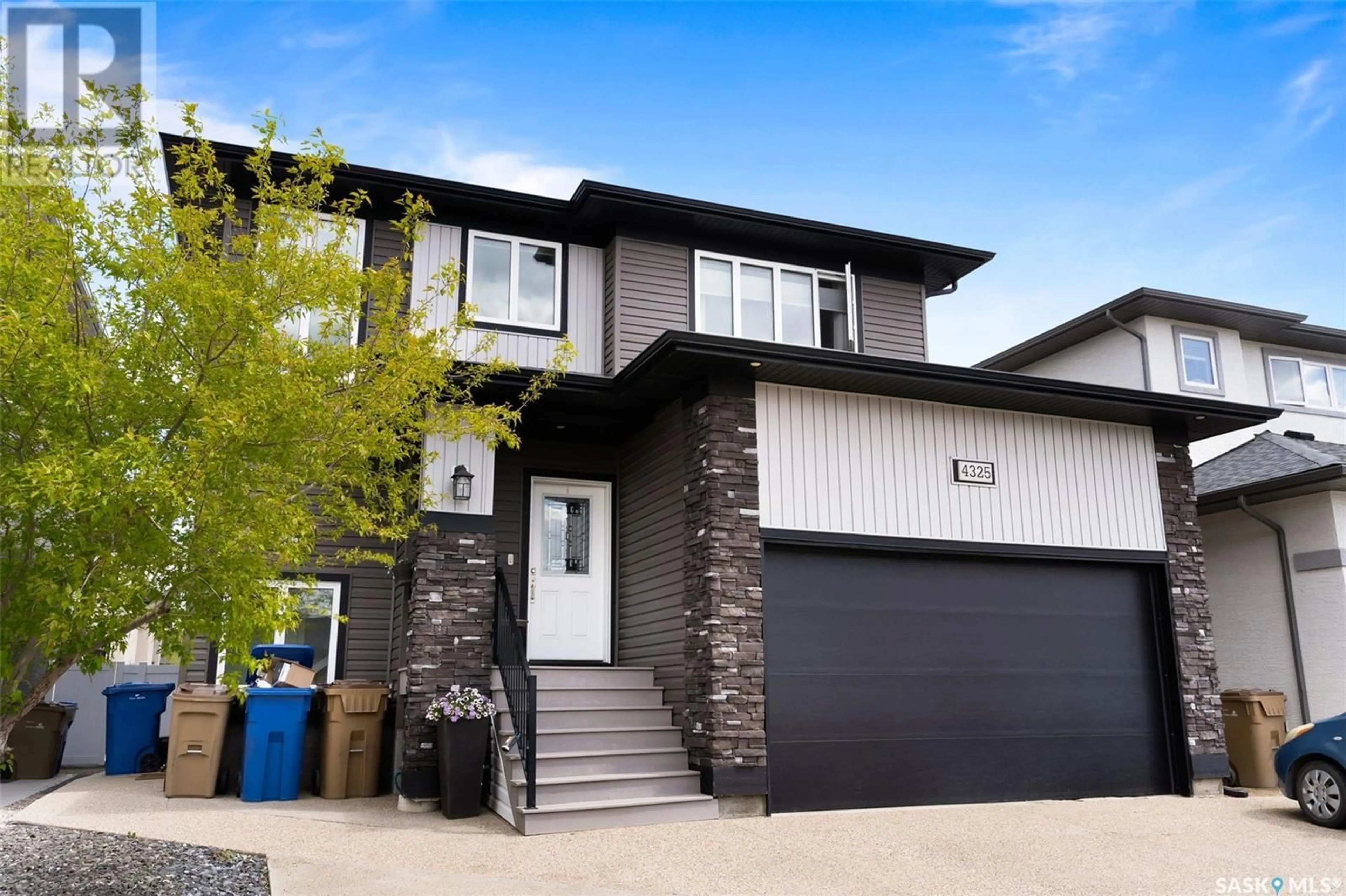 Home with vinyl exterior material, street for 4325 WAKELING STREET, Regina Saskatchewan S4W0L7