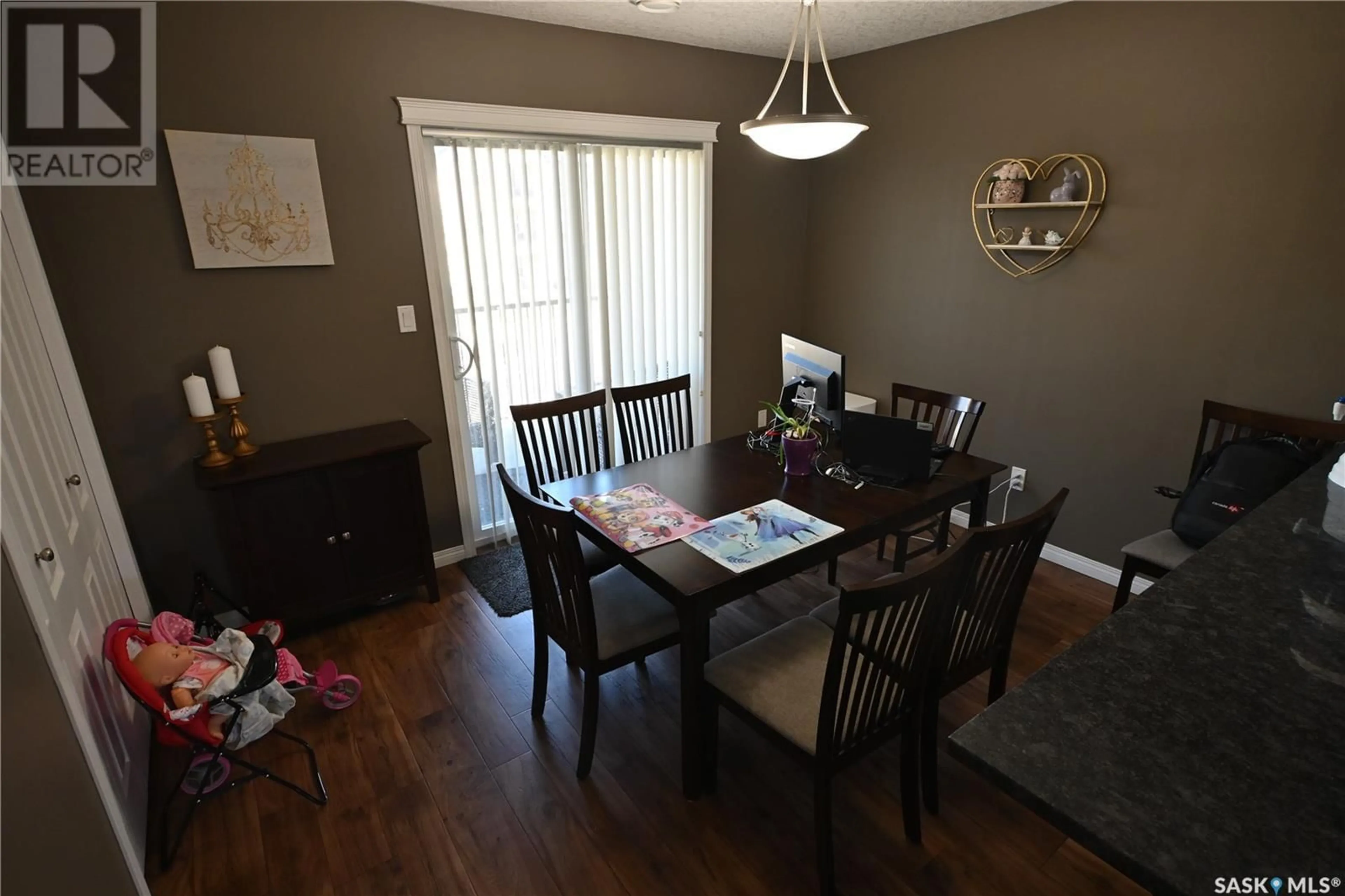 Dining room, wood/laminate floor for 109 - 3810 DEWDNEY AVENUE, Regina Saskatchewan S4Z0A6