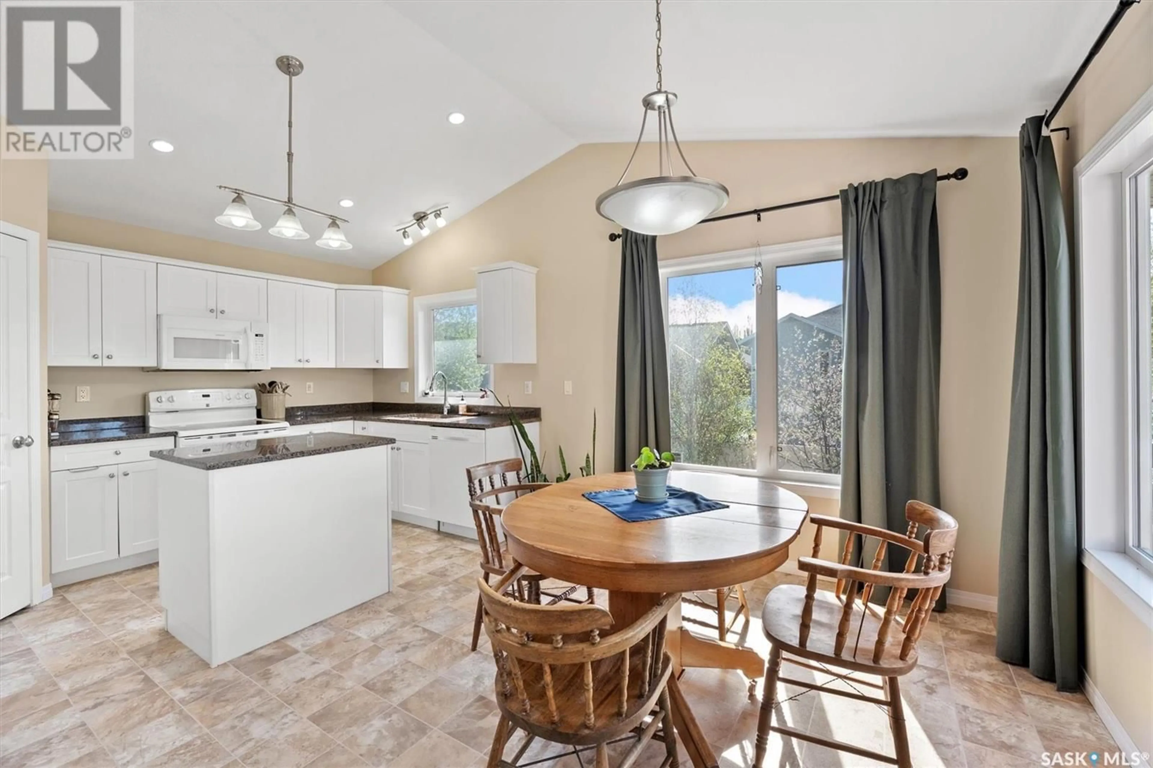 Open concept kitchen, ceramic/tile floor for 1210 REMPEL CRESCENT, Saskatoon Saskatchewan S7T0M2
