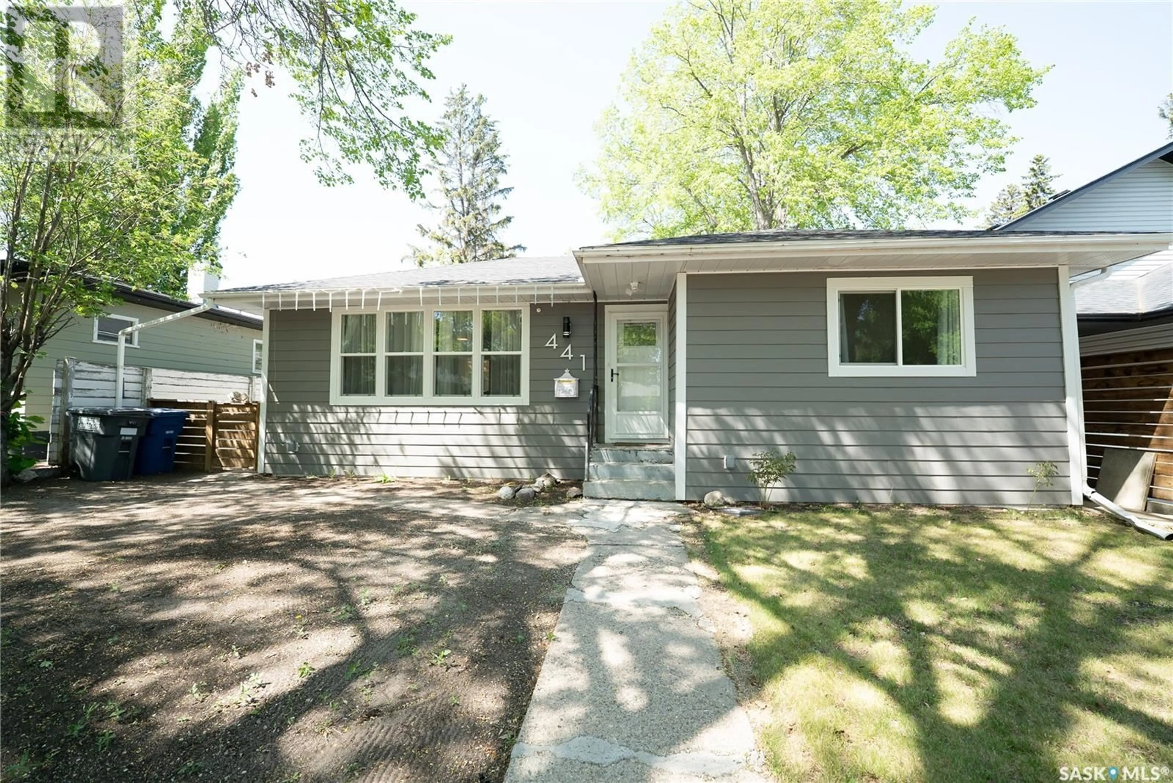 Home with vinyl exterior material, street for 441 Q AVENUE, Saskatoon Saskatchewan S7L2X9