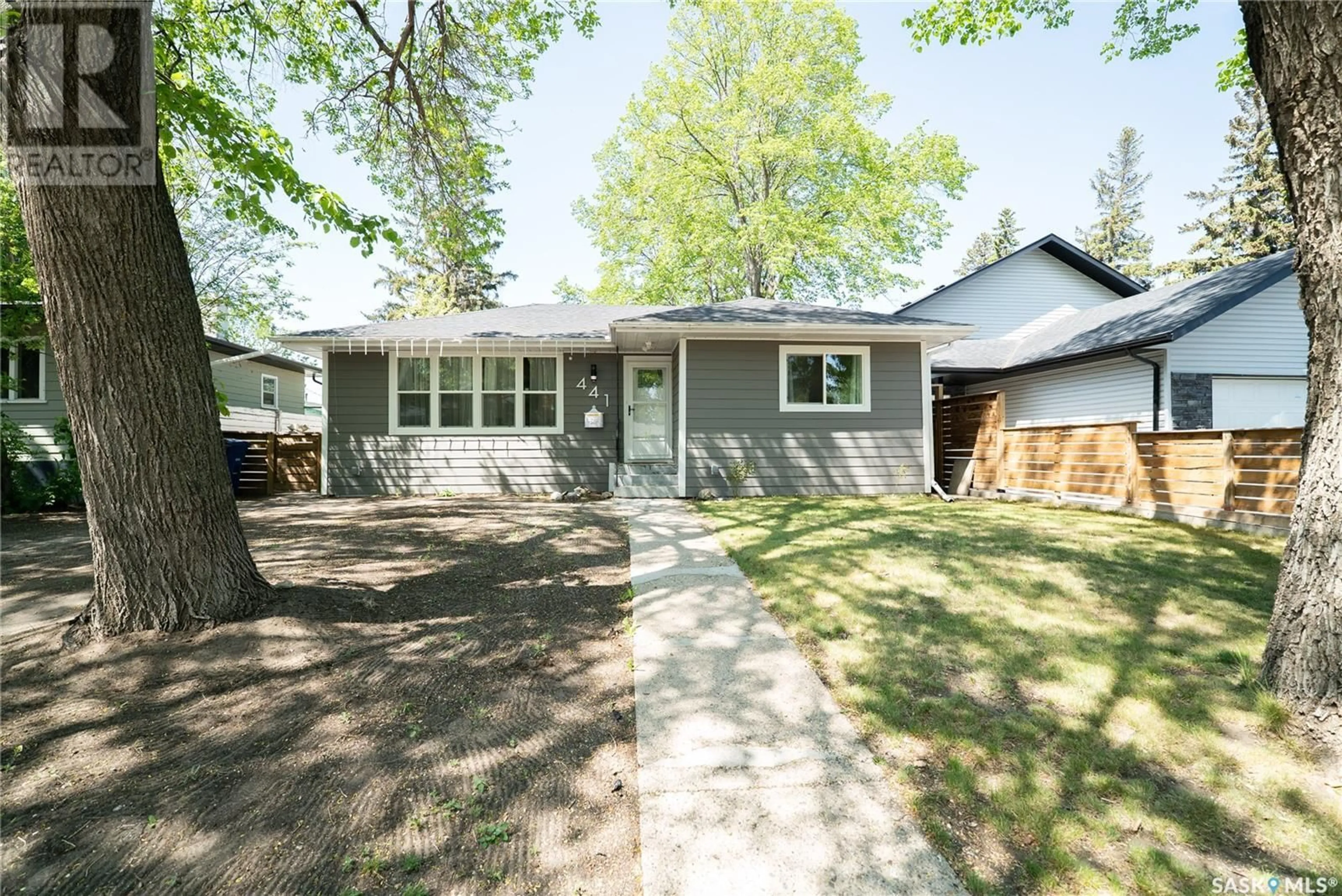 Home with vinyl exterior material, street for 441 Q AVENUE, Saskatoon Saskatchewan S7L2X9