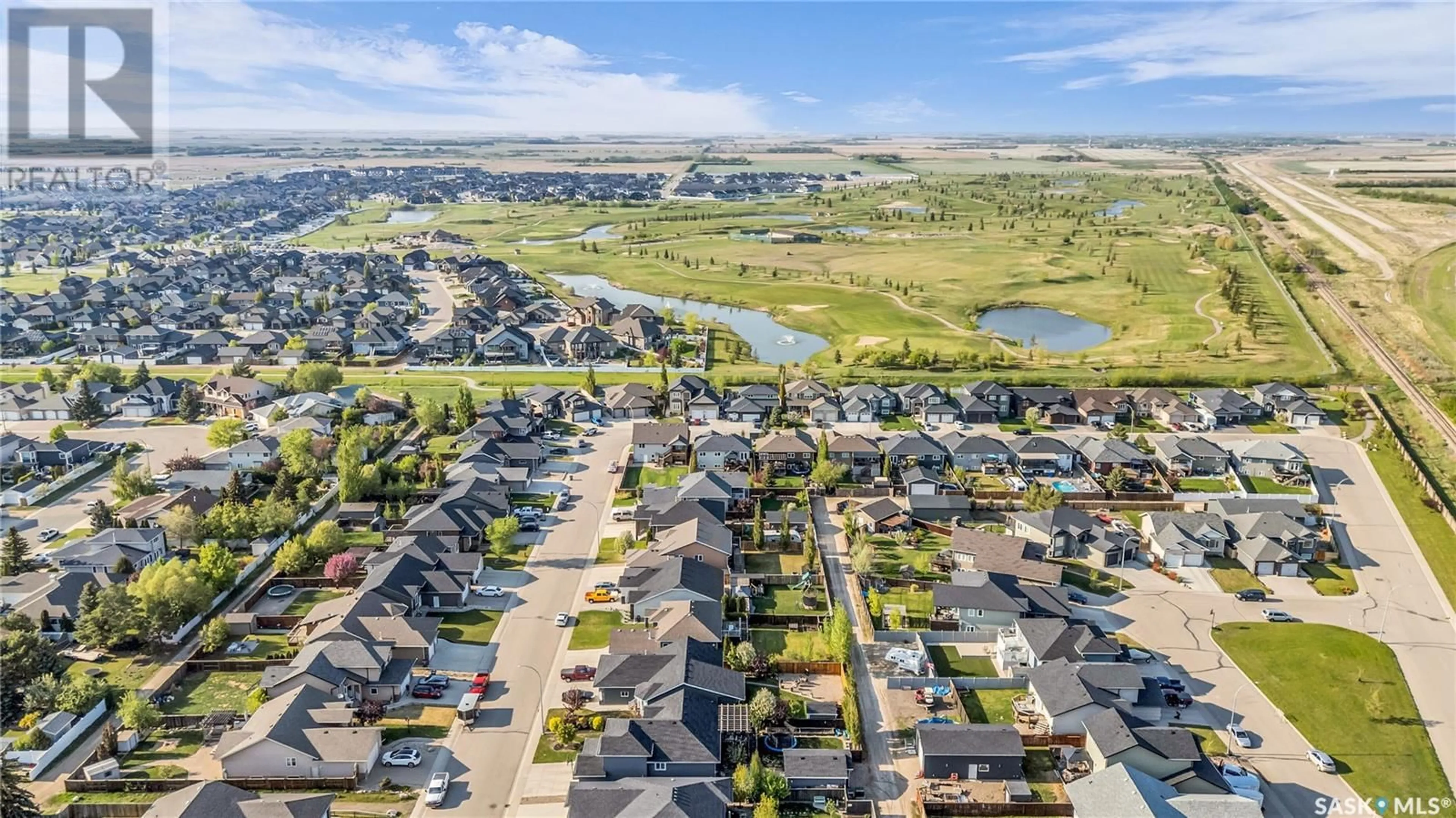 A pic from outside/outdoor area/front of a property/back of a property/a pic from drone, water/lake/river/ocean view for 511 ANTLER CRESCENT, Warman Saskatchewan S0K4S1