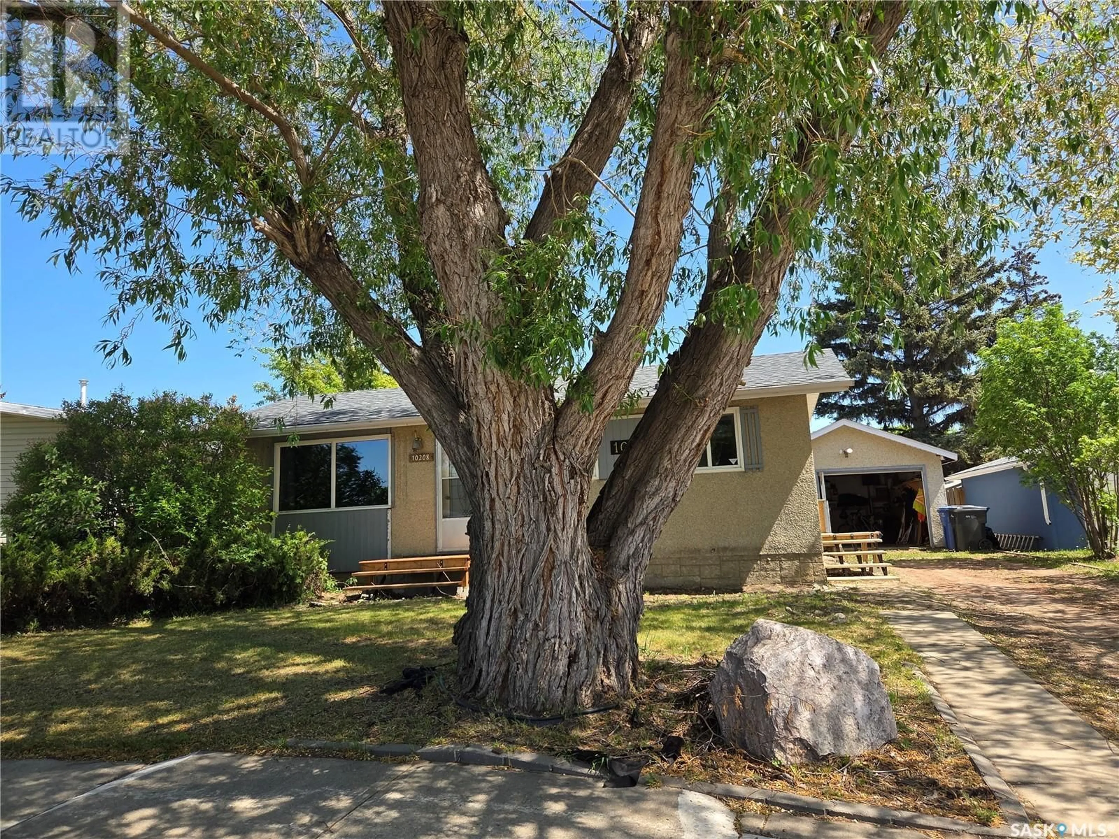 Home with vinyl exterior material, street for 10208 BORDEN CRESCENT, North Battleford Saskatchewan S9A3A1
